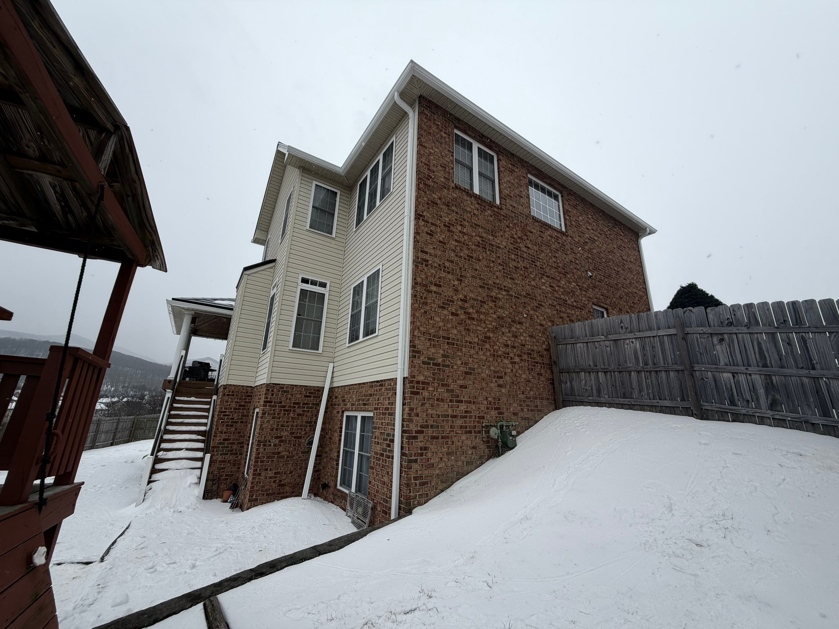 Winter Tesla Solar Roof Installation! by American Home Contractors