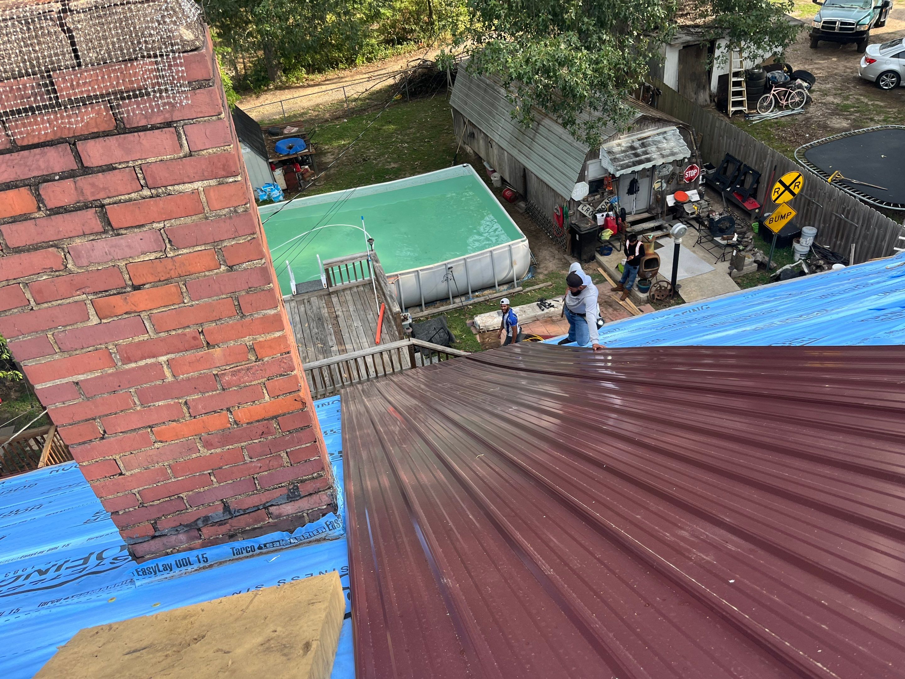 Residential Metal Roof Replacement using Reed's Metals: Colored Residental Panel (Burgundy) by Hostetler Roofing