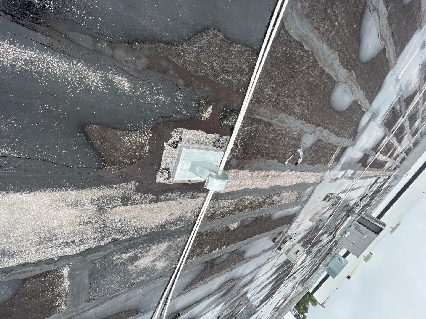 Commercial Roofing Repair using Roof Sealant by Four Peaks Roofing