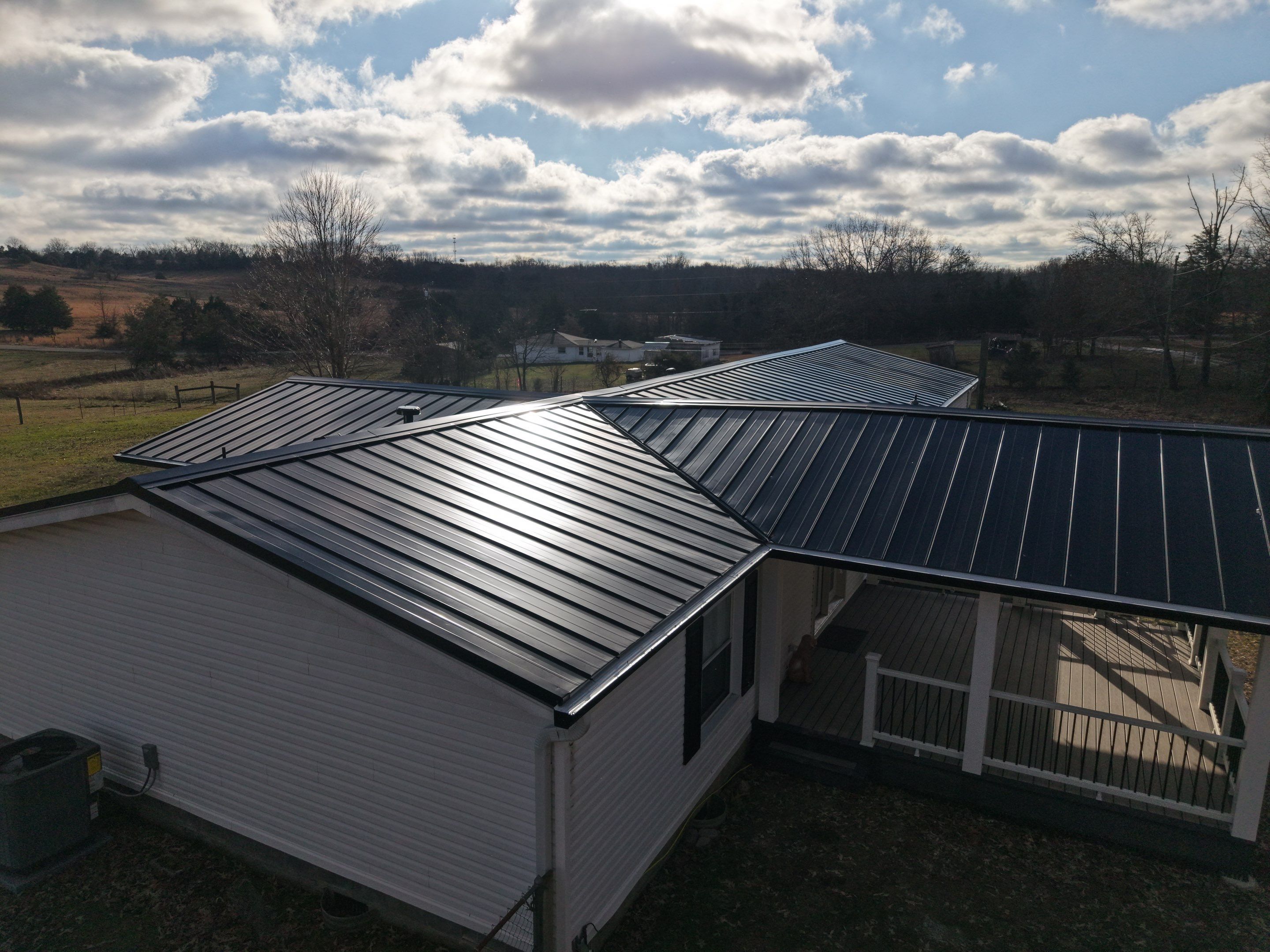 Standing Seam Roof & Black Gutters