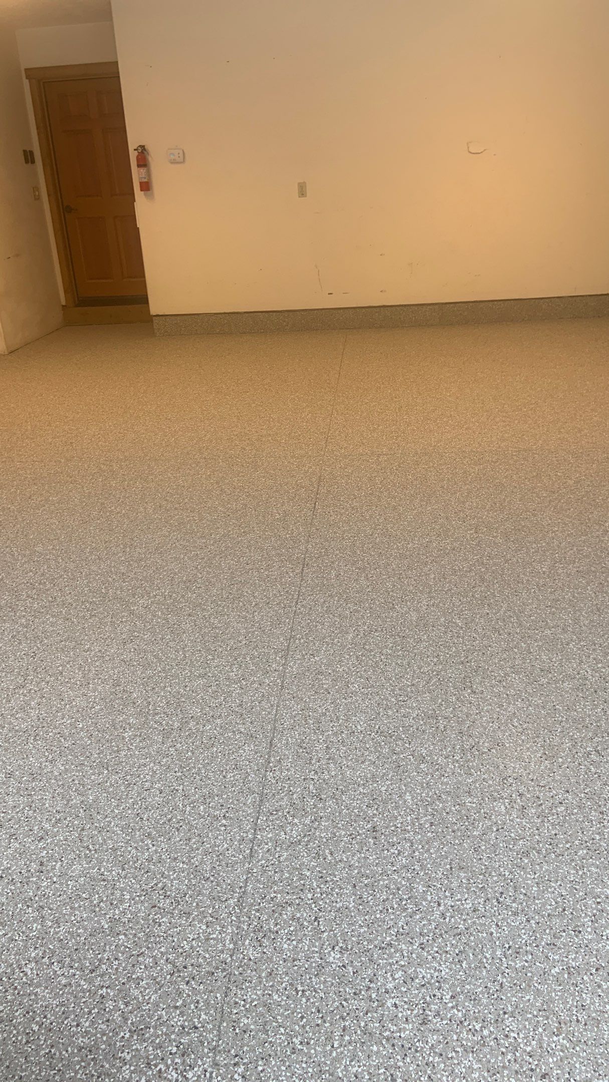 Garage Transformation using Pebble Beach by Croc Coatings, LLC