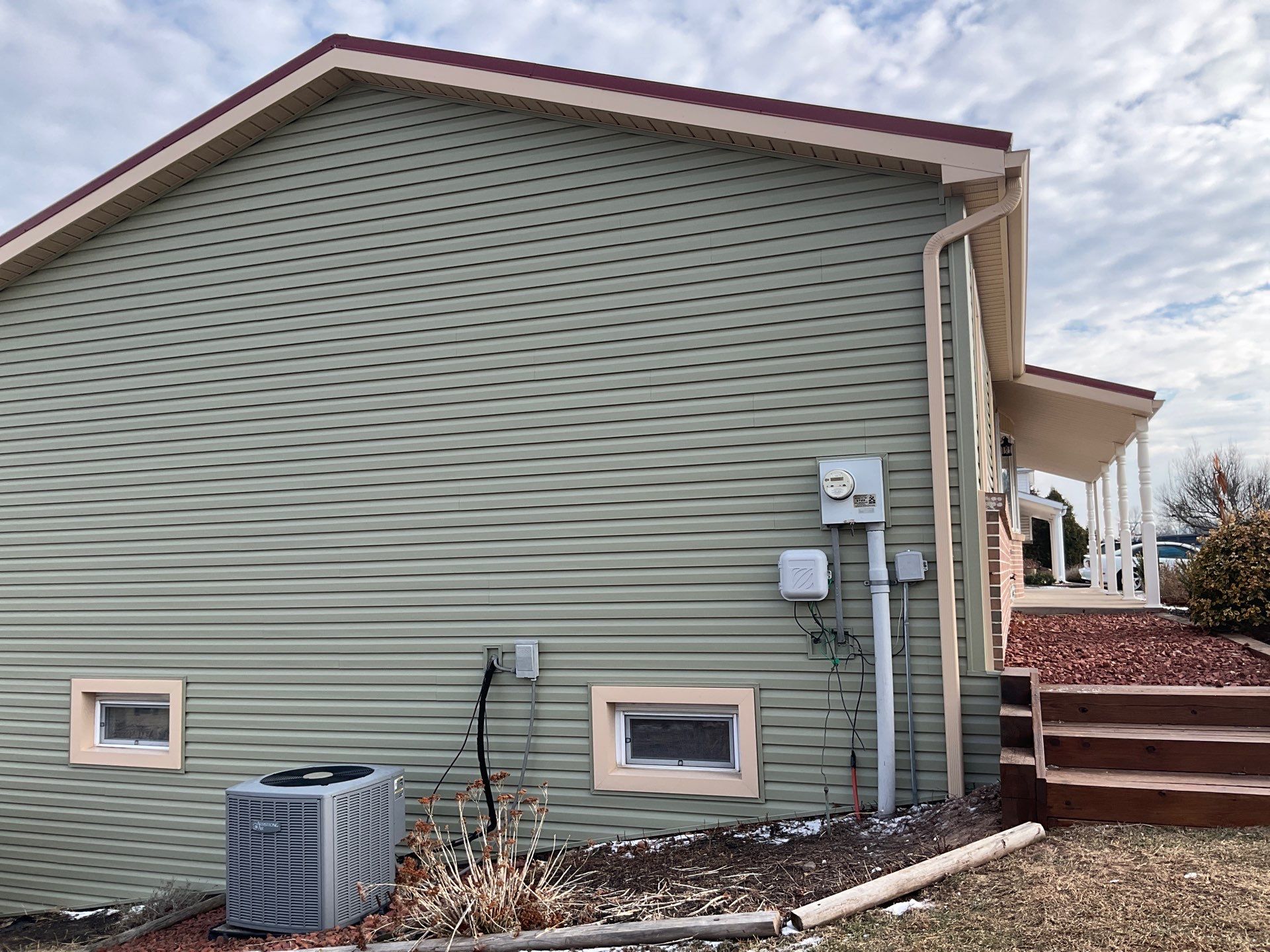 Vinyl Siding Replacement and Patio Door Installation in Elizabethville by Esh Builders