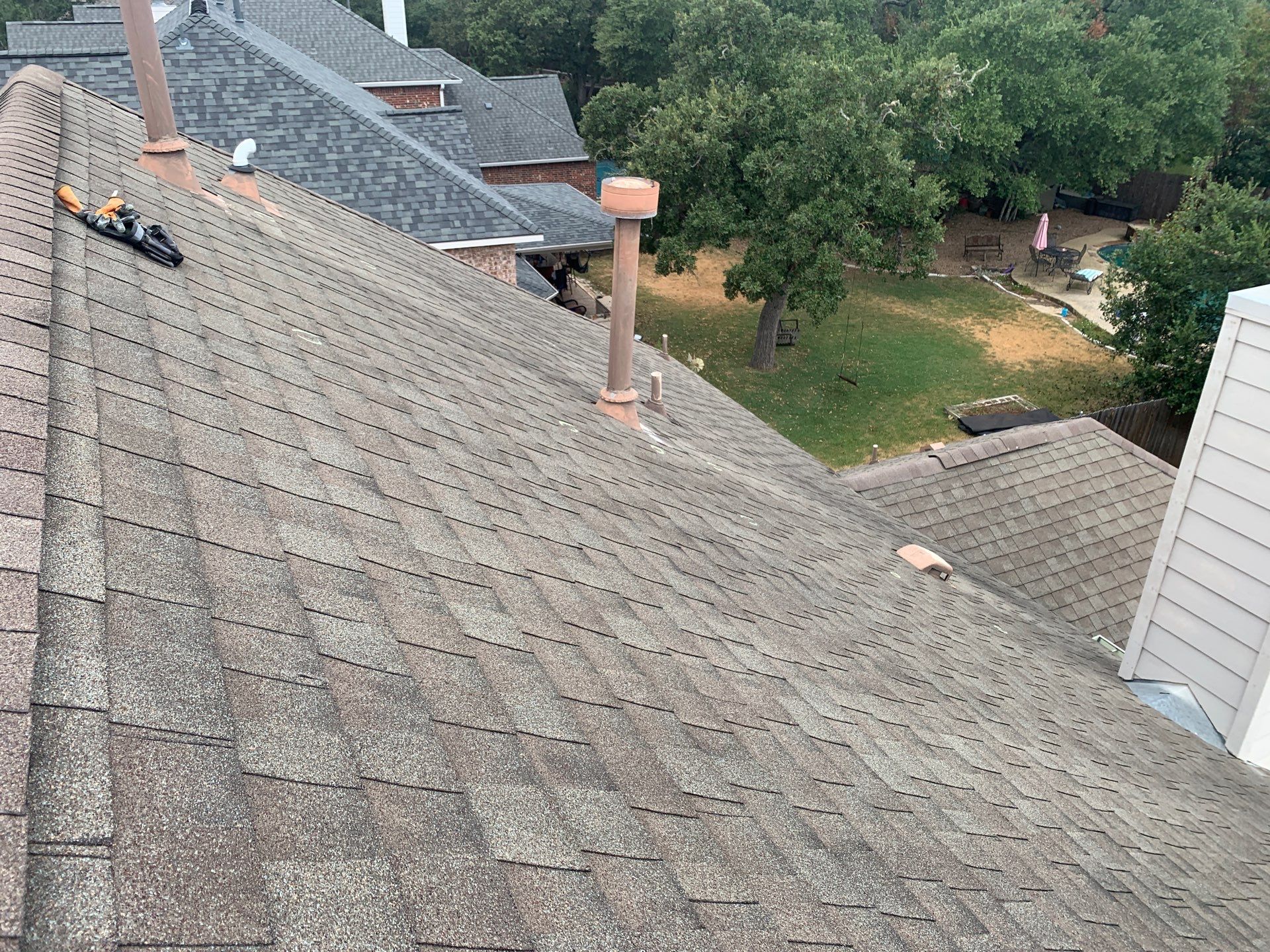Hail Damage Restoration and Asphalt Shingle Roof Replacement in Austin by Caliber Restoration LLC