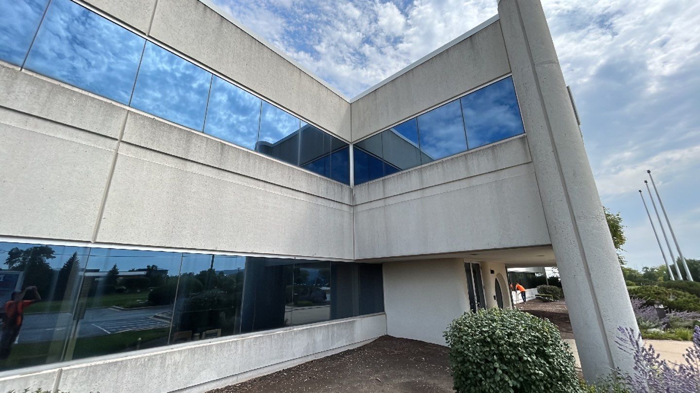 commercial pressure washing using Algaecide, soft wash soap by Northern Power Washing LLC.