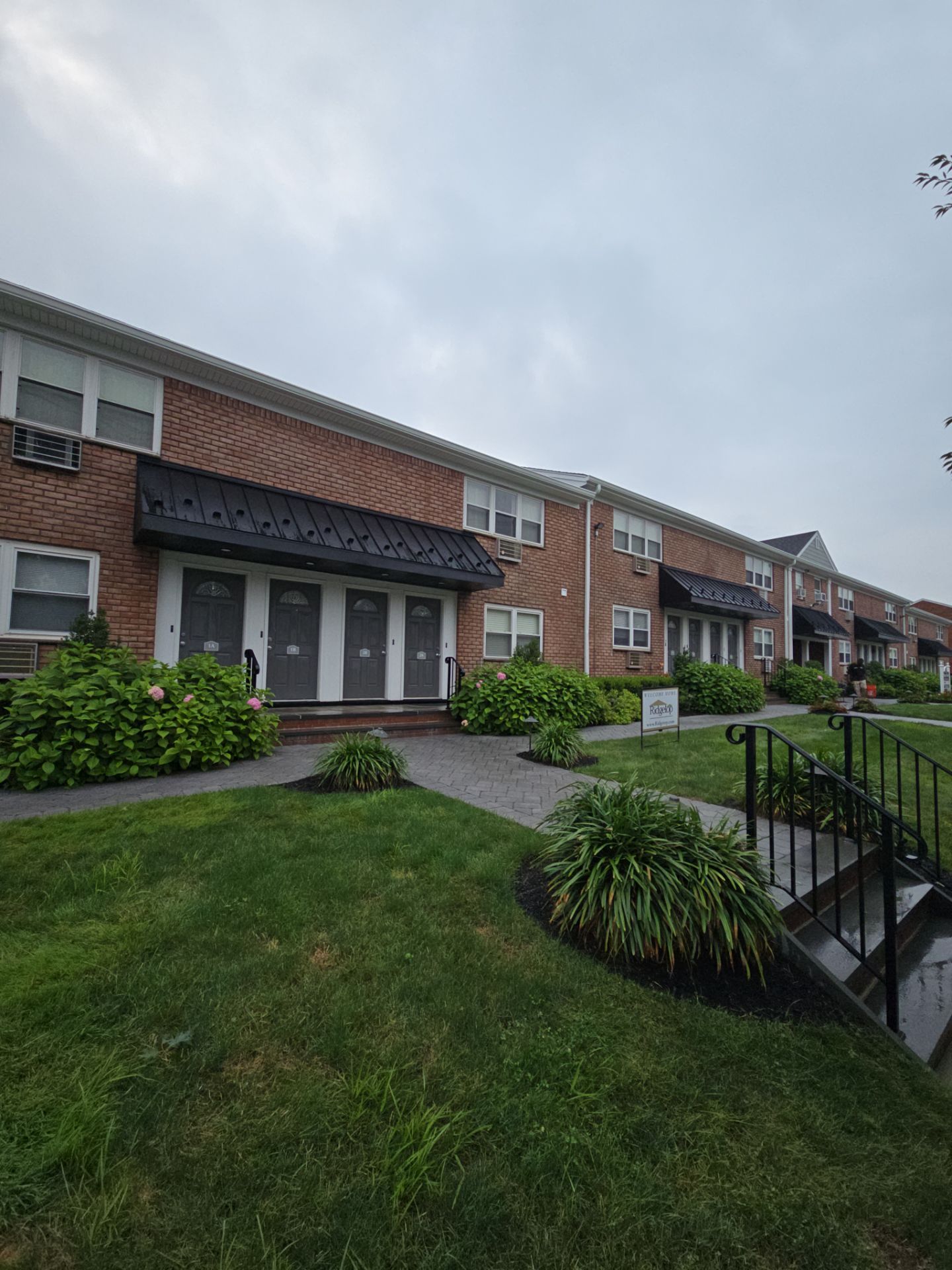 Multi-Unit Apartment Complex Exterior Brick Painting Project in Hackensack by Spectrum Painting, LLC