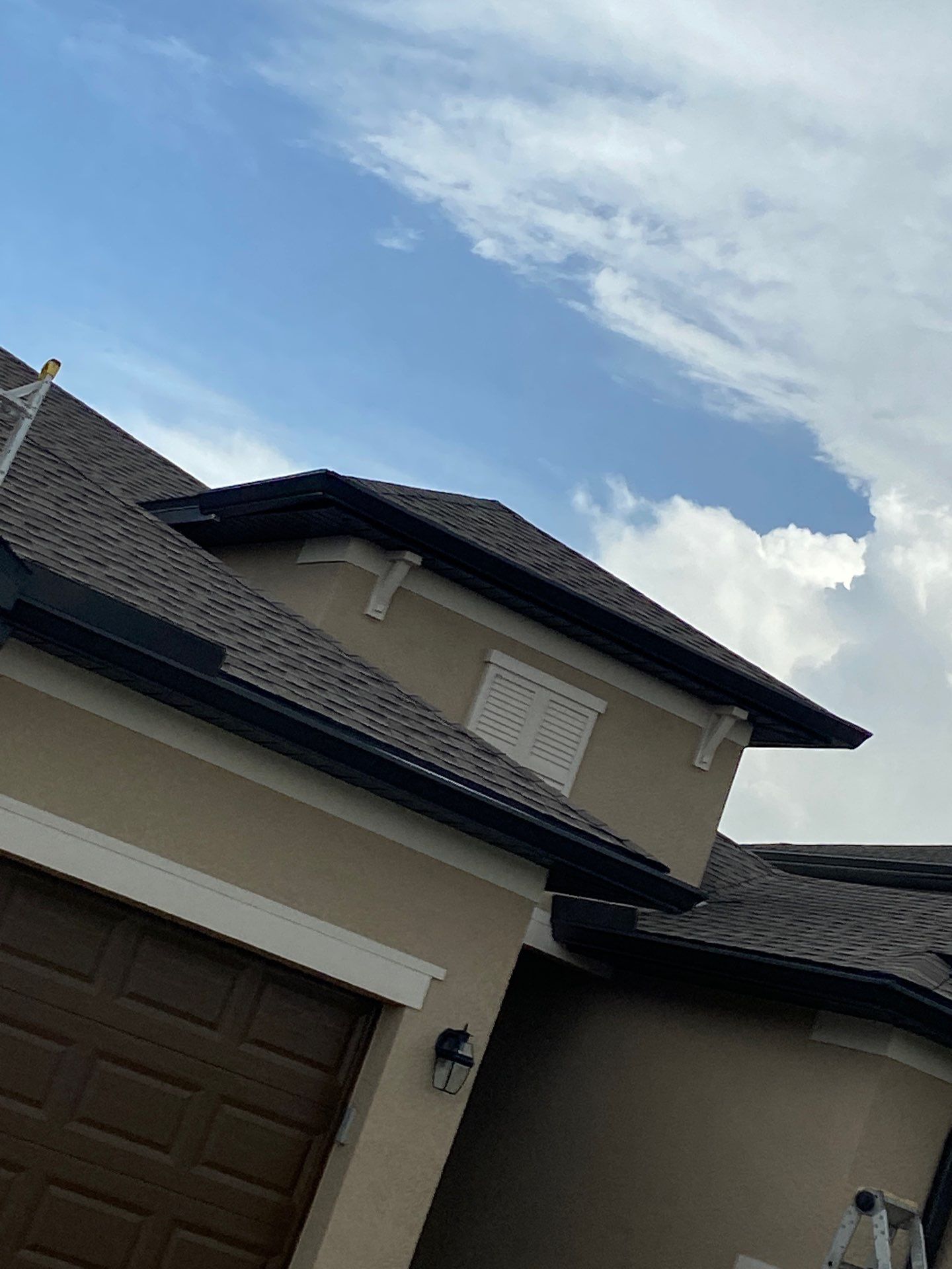 Brown Seamless Gutters for Homes in Fort Myers by Gutter Professors