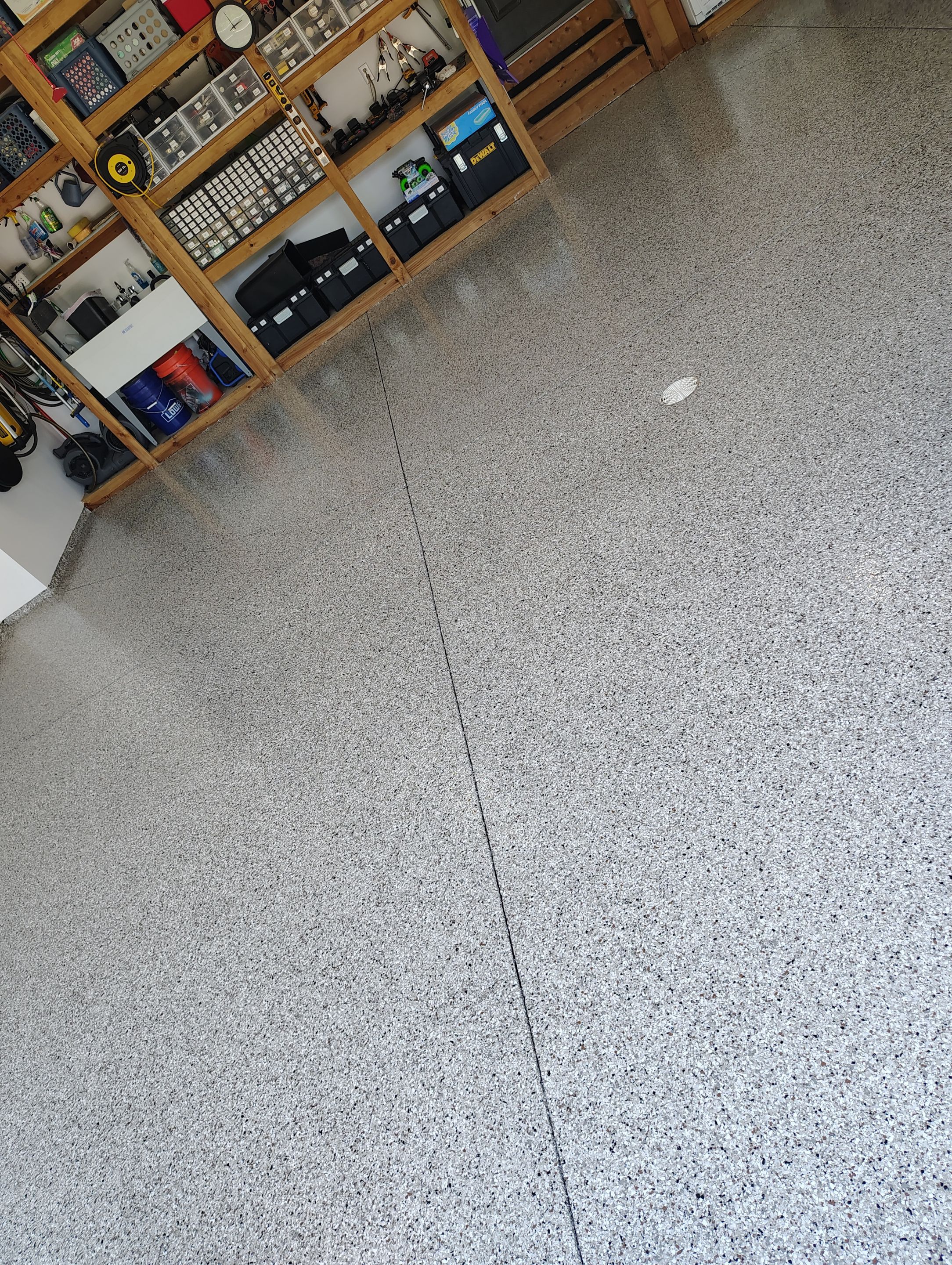 Coyote Garage Floor Coating in Sioux Falls by Select Painting, Coatings & Garage Cabinets