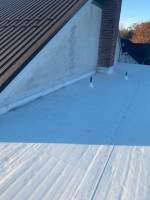 Roof Installation using Silicone TPO by ExteriorPros