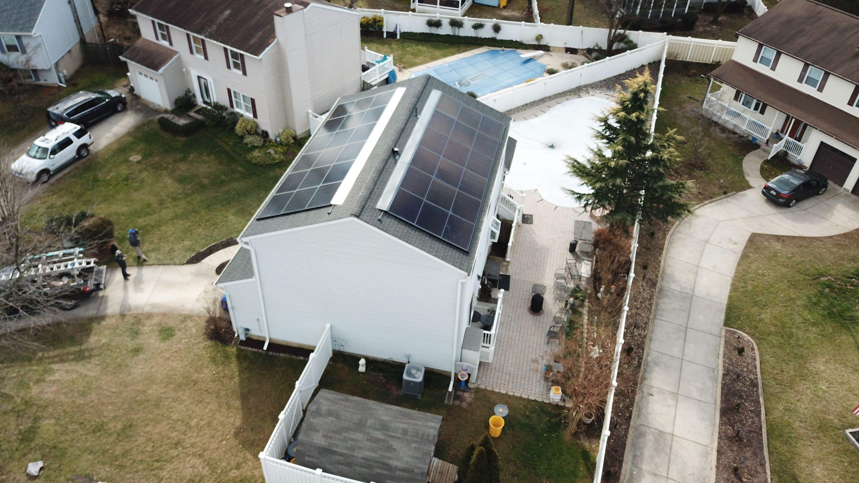 Roof Replacement with GAF Decotech integrated solar panels by American Home Contractors