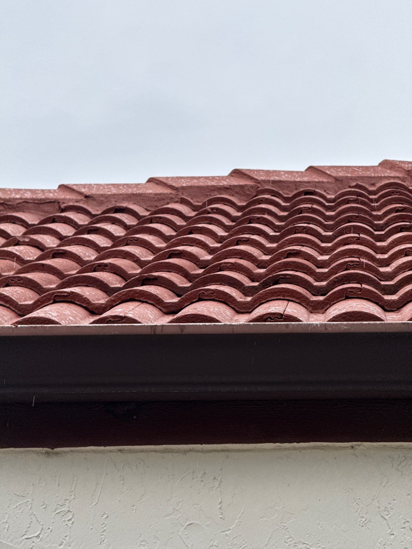 Residential Tile Roof Replacement and Gutter Installation in Winter Park by Pinnacle Roofing Group