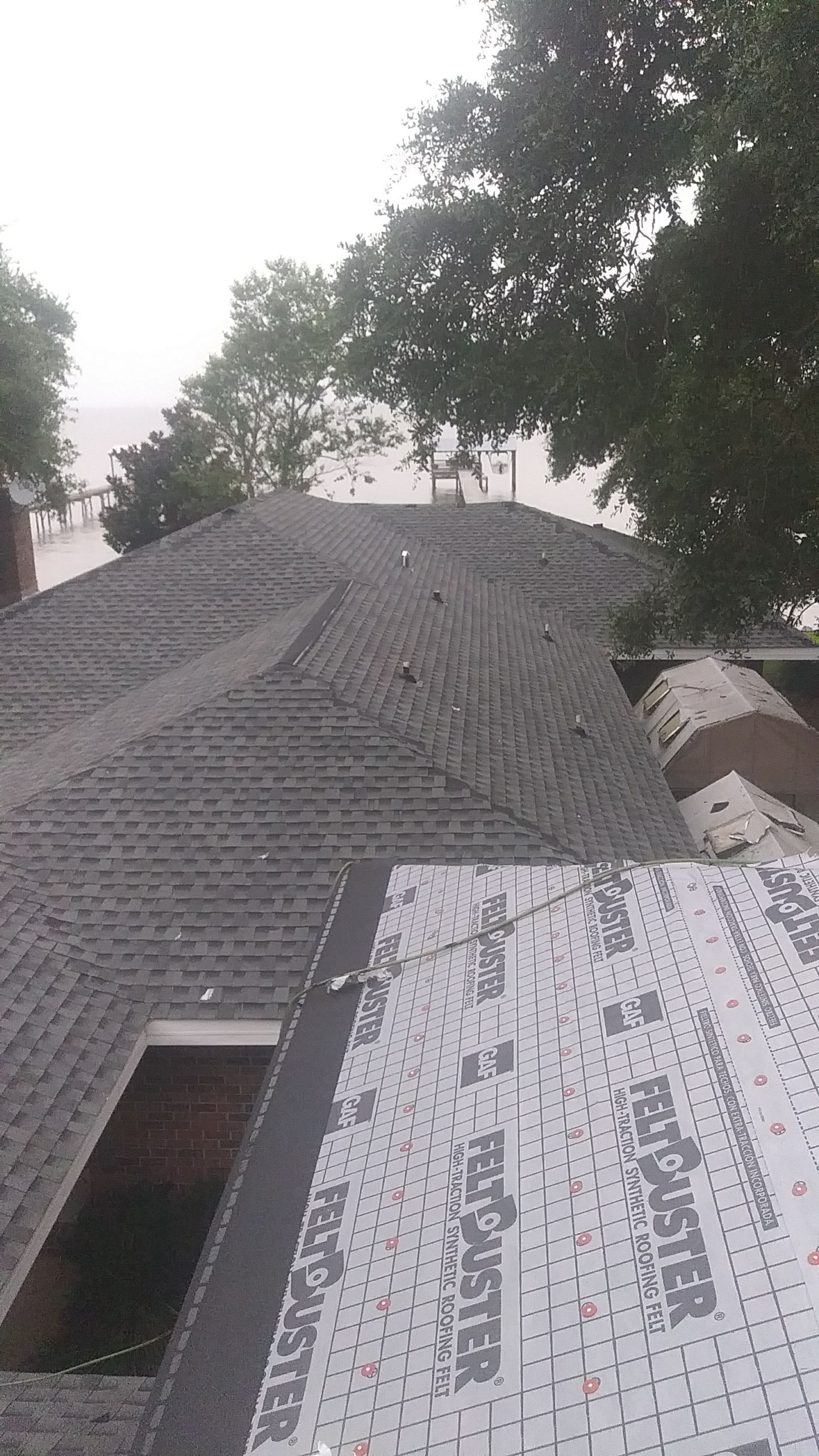 Residential Roofing Installation using Roof Replacement by American Roofing & Construction LLC