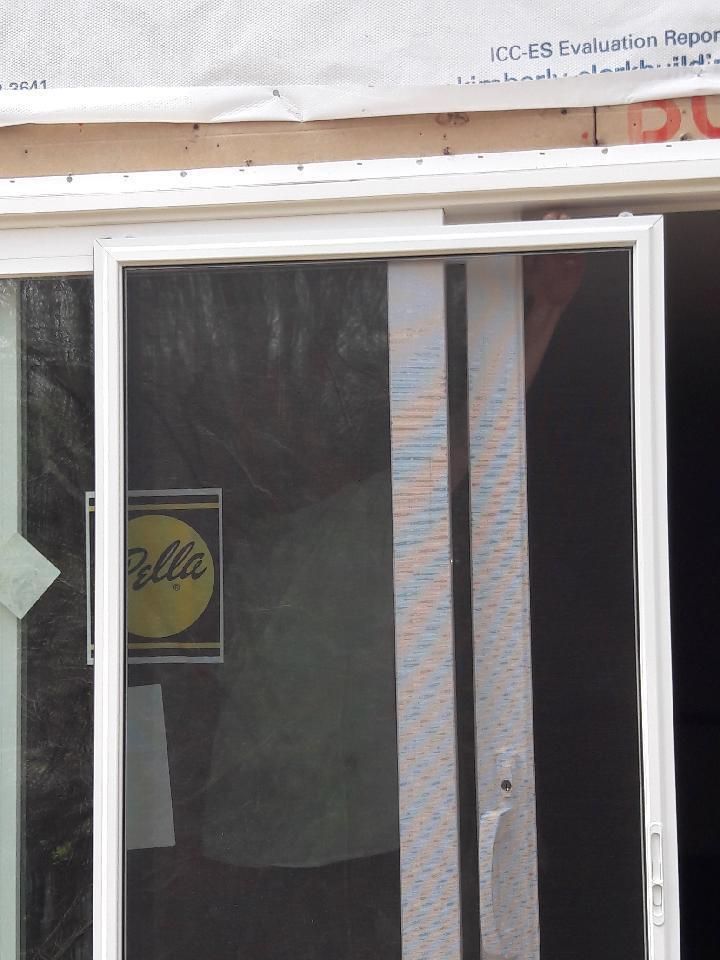 Siding Installation using LP SmartSide and Pella Vinyl Windows by MODERN EXTERIOR SYSTEMS