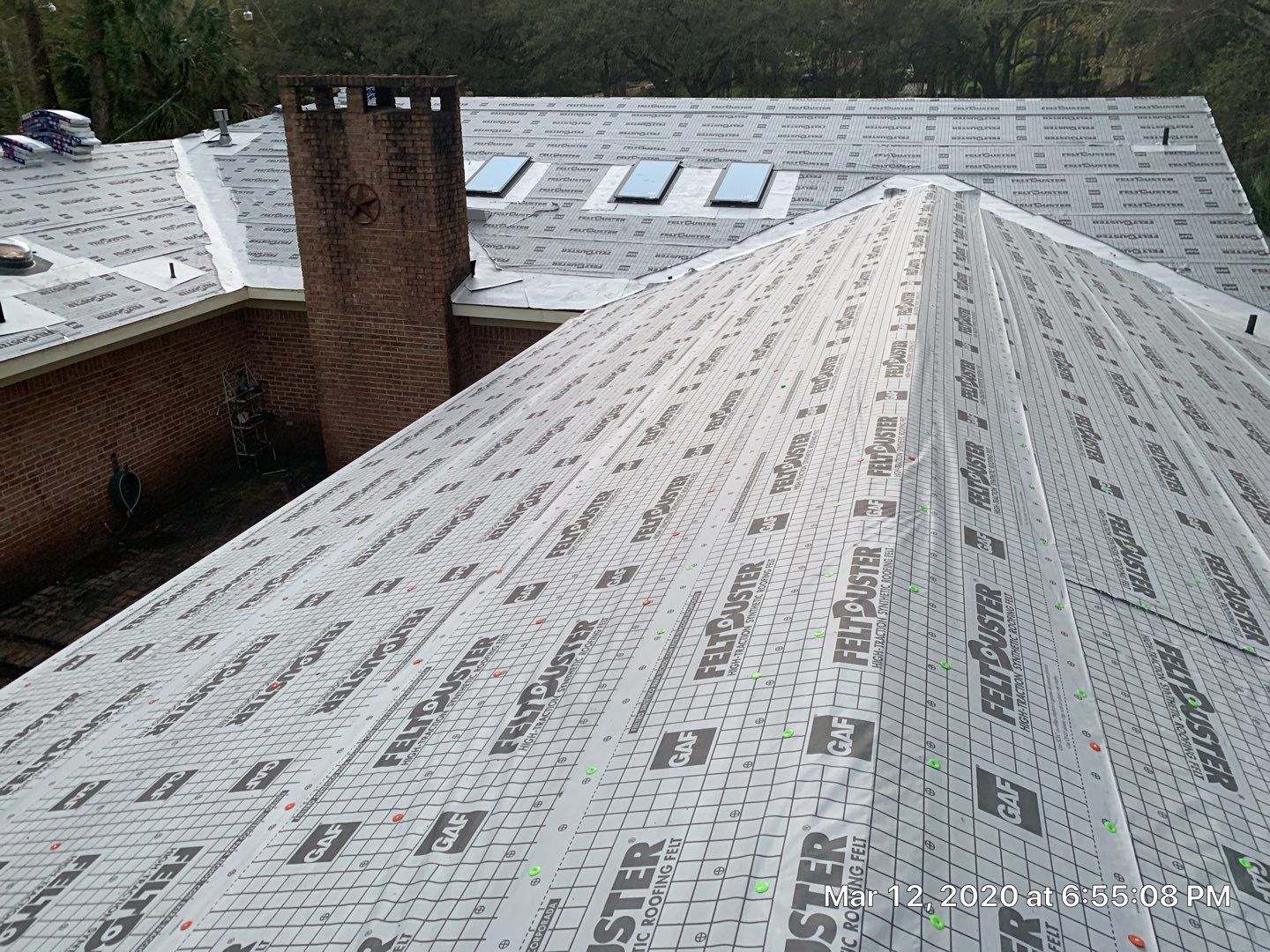 Residential Roofing Installation using Roof Replacement by American Roofing & Construction LLC