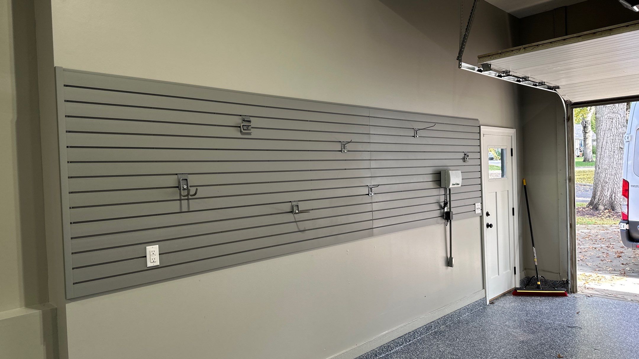 Matt F. added cabinets and slotwall to his garage by Banner Garage