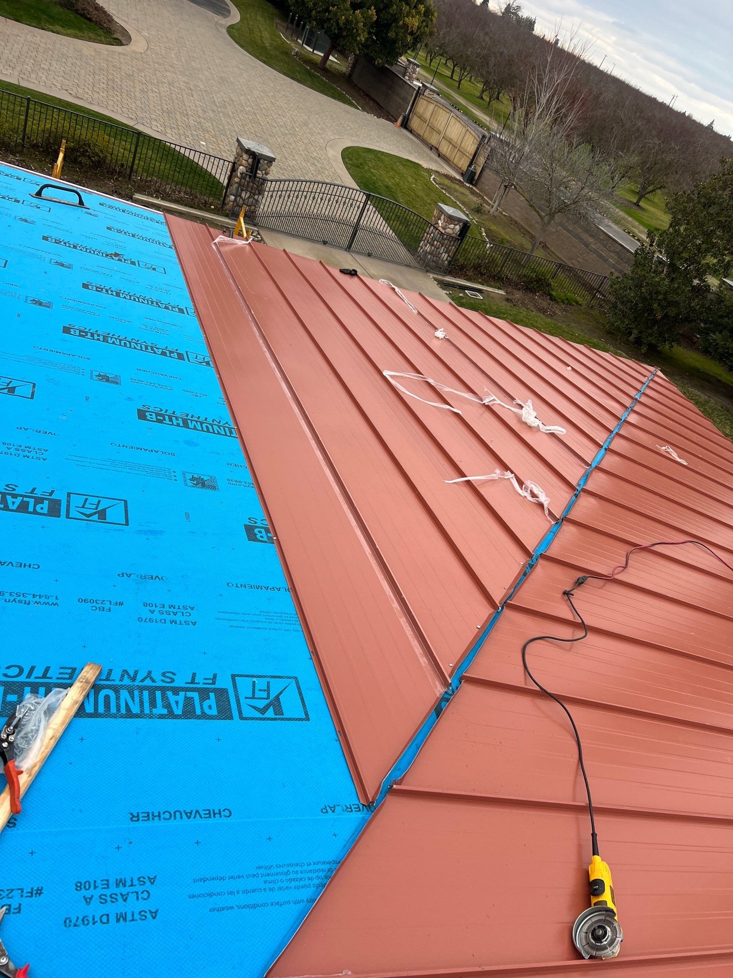 Tile, Metal, and TPO roofing project (new construction) by Straight Edge Roofing Inc