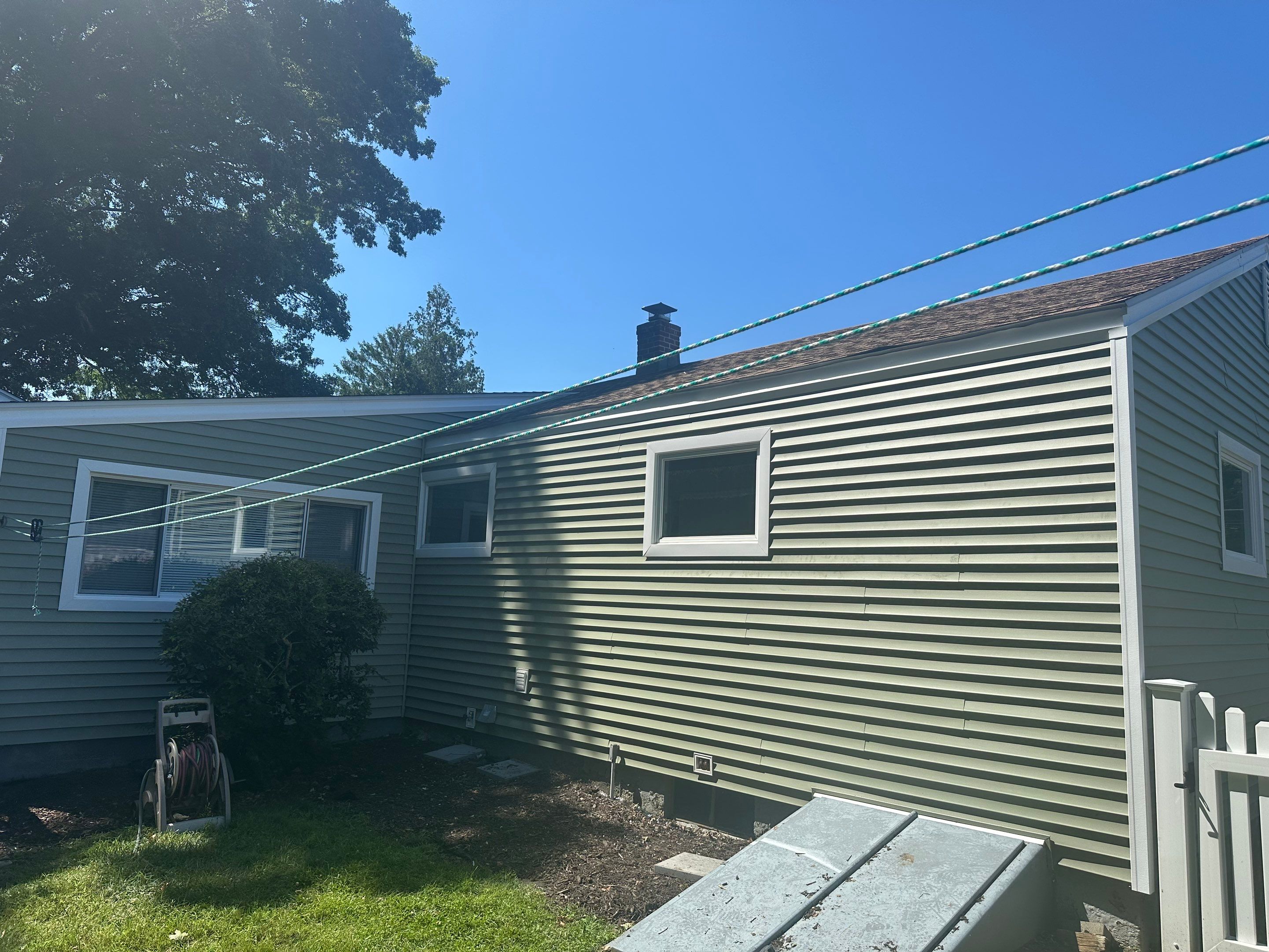 Siding Installation using Clapboard Monogram D4 Cypress by A Plus Exterior