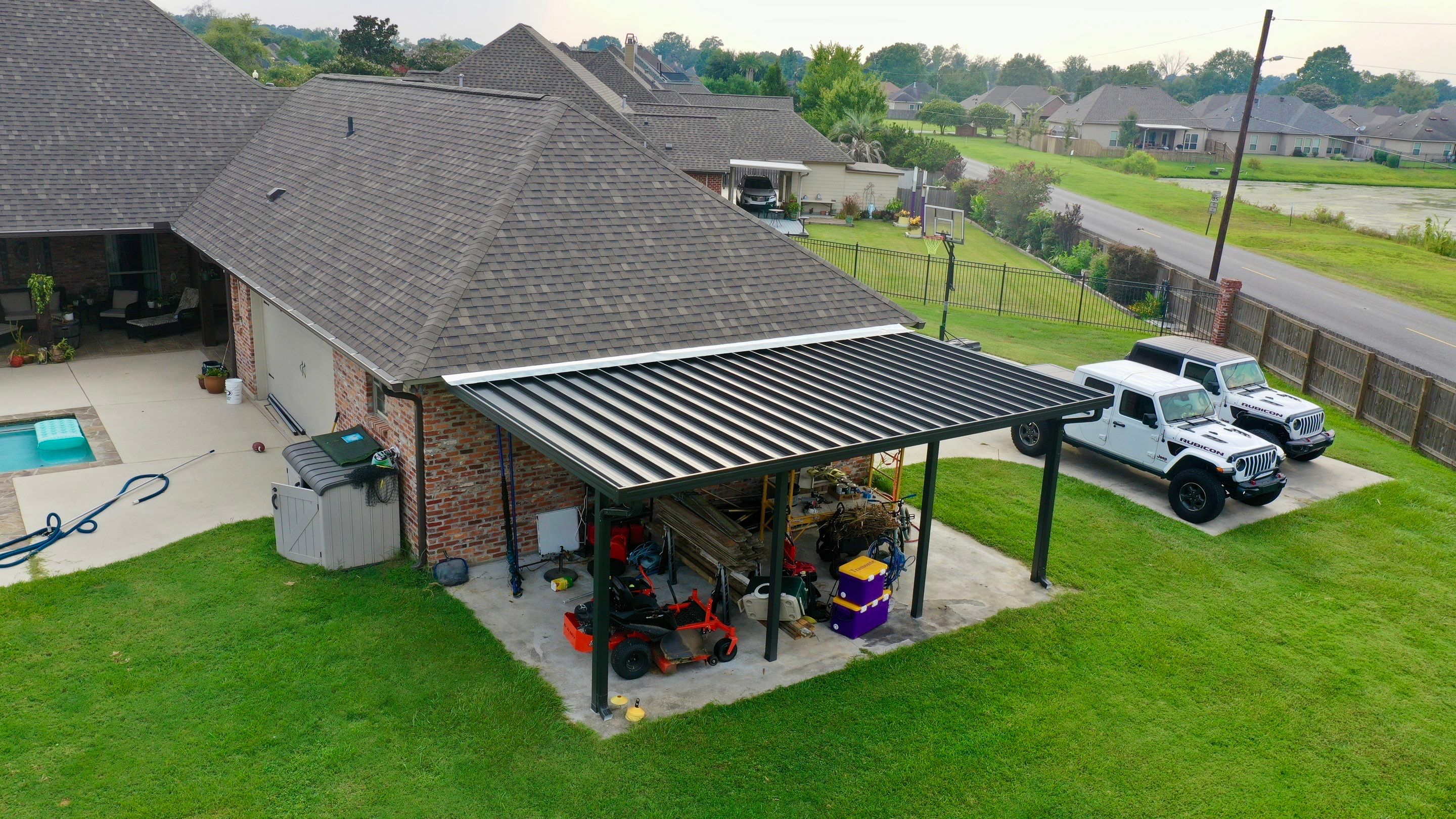 Residential Roofing Installation using Atlas Pinnacle Impact Weathered Wood; Weathered Bronze Gutters  by Top Team Construction