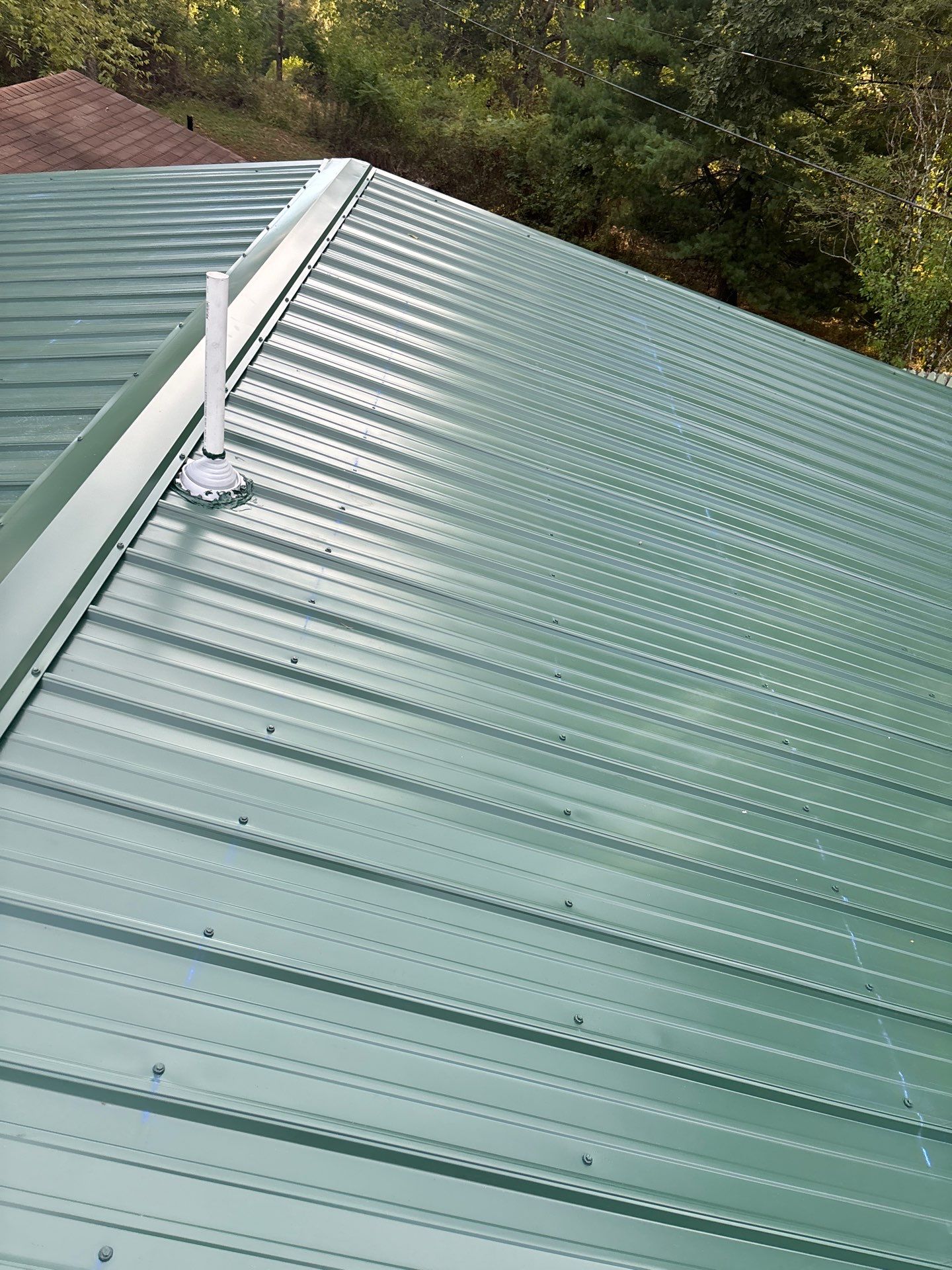 Residential Roofing Installation using Metal by Rainstoppers Roofing