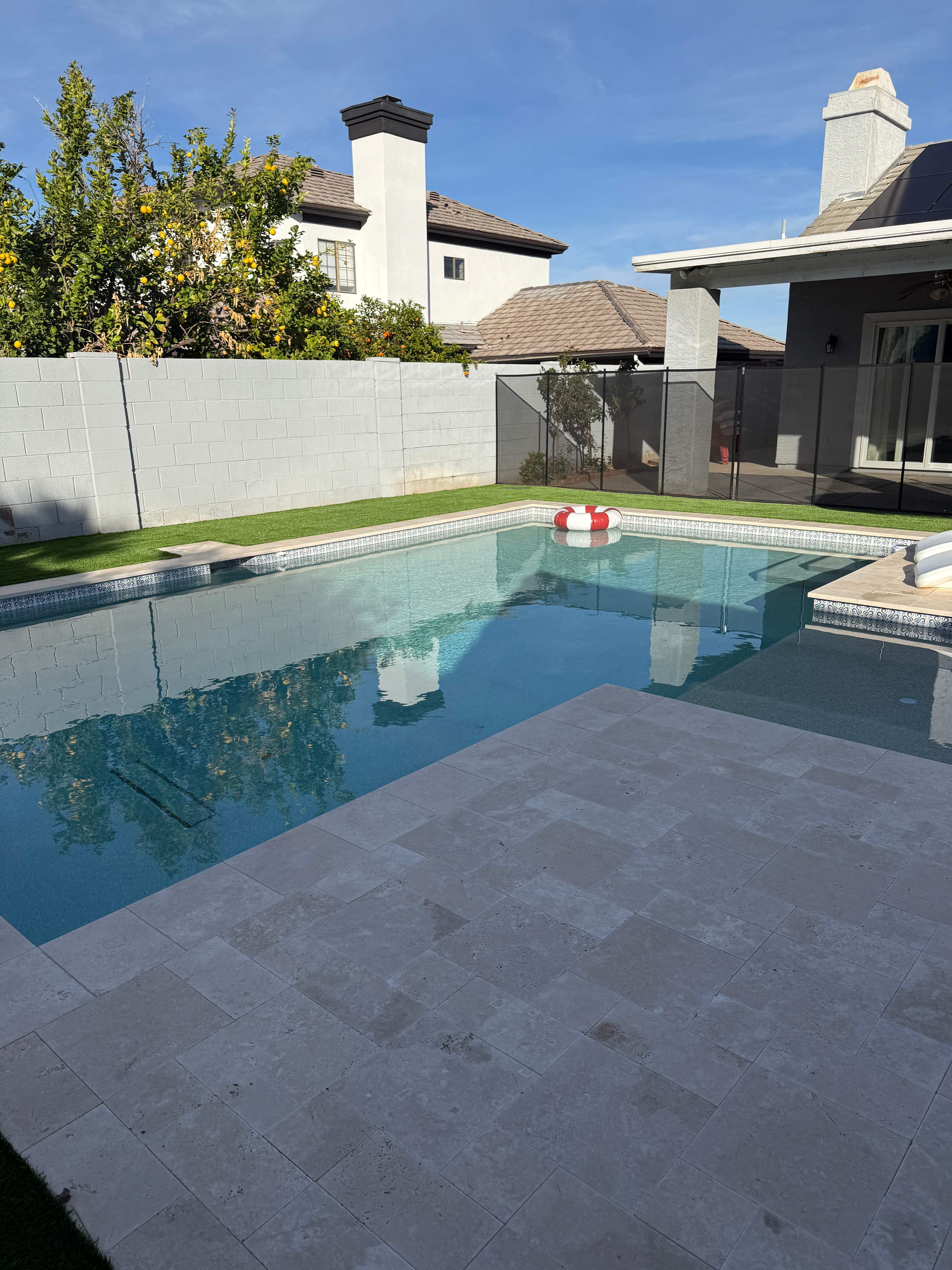 Pool build with baja step and pebble finish by Modern Pools