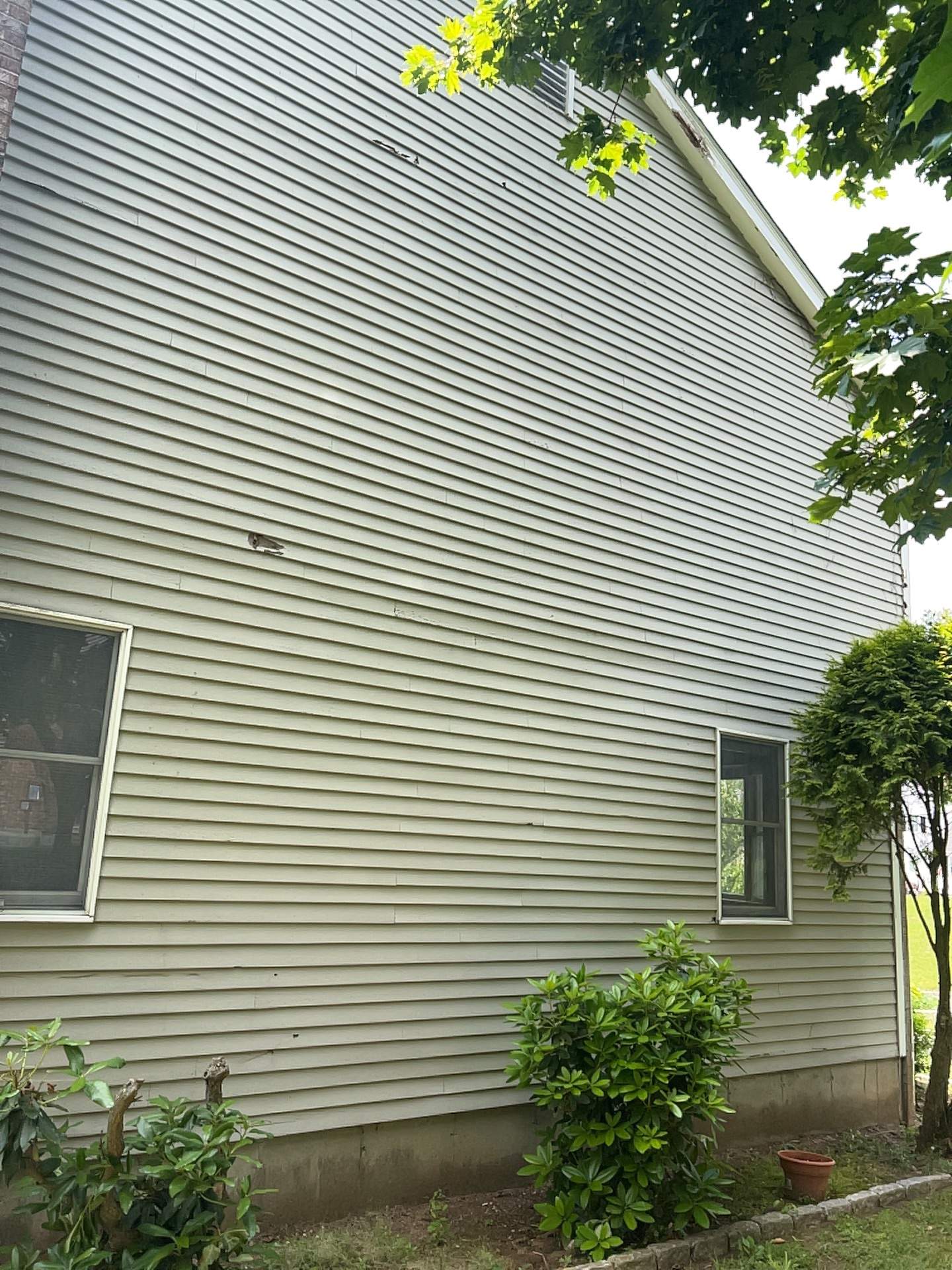 Siding Installation using Mainstreet Colonial & White gutters by A Plus Exterior