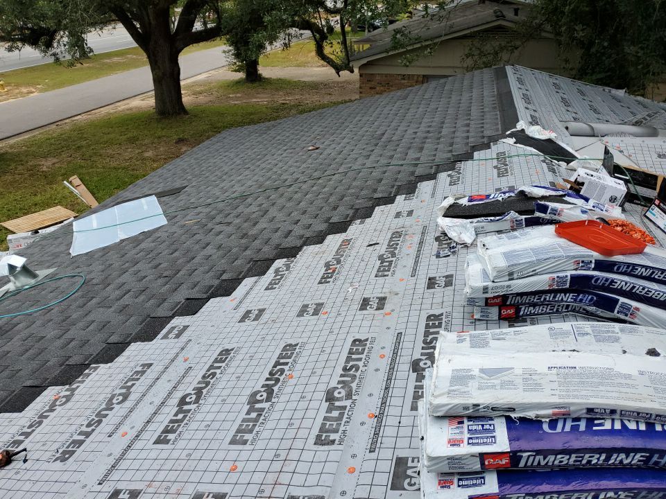 Residential Roofing Installation using Roof Replacement by American Roofing & Construction LLC