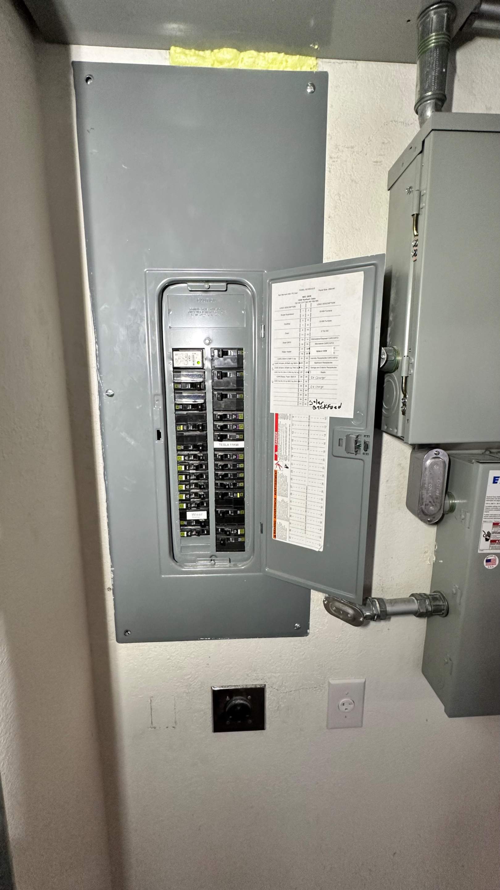 Tesla Wall Connector. Can lights. Spa disconnect. Exterior Outlets.  by Get Stoked Renovations