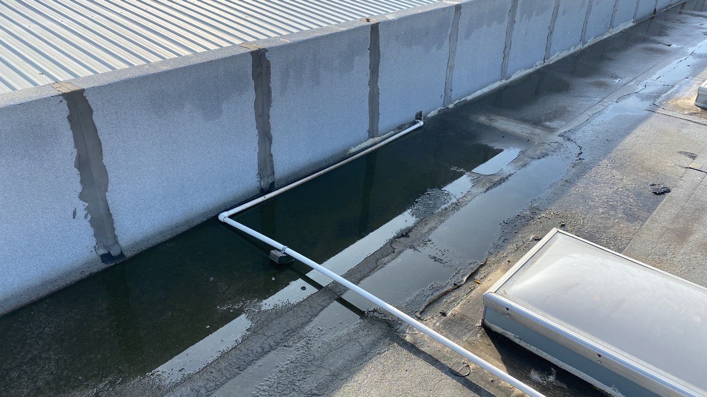 Spray foam and coatings using Conklin Benchmark/PUMA XL coatings and spray foam by Straight Edge Roofing Inc