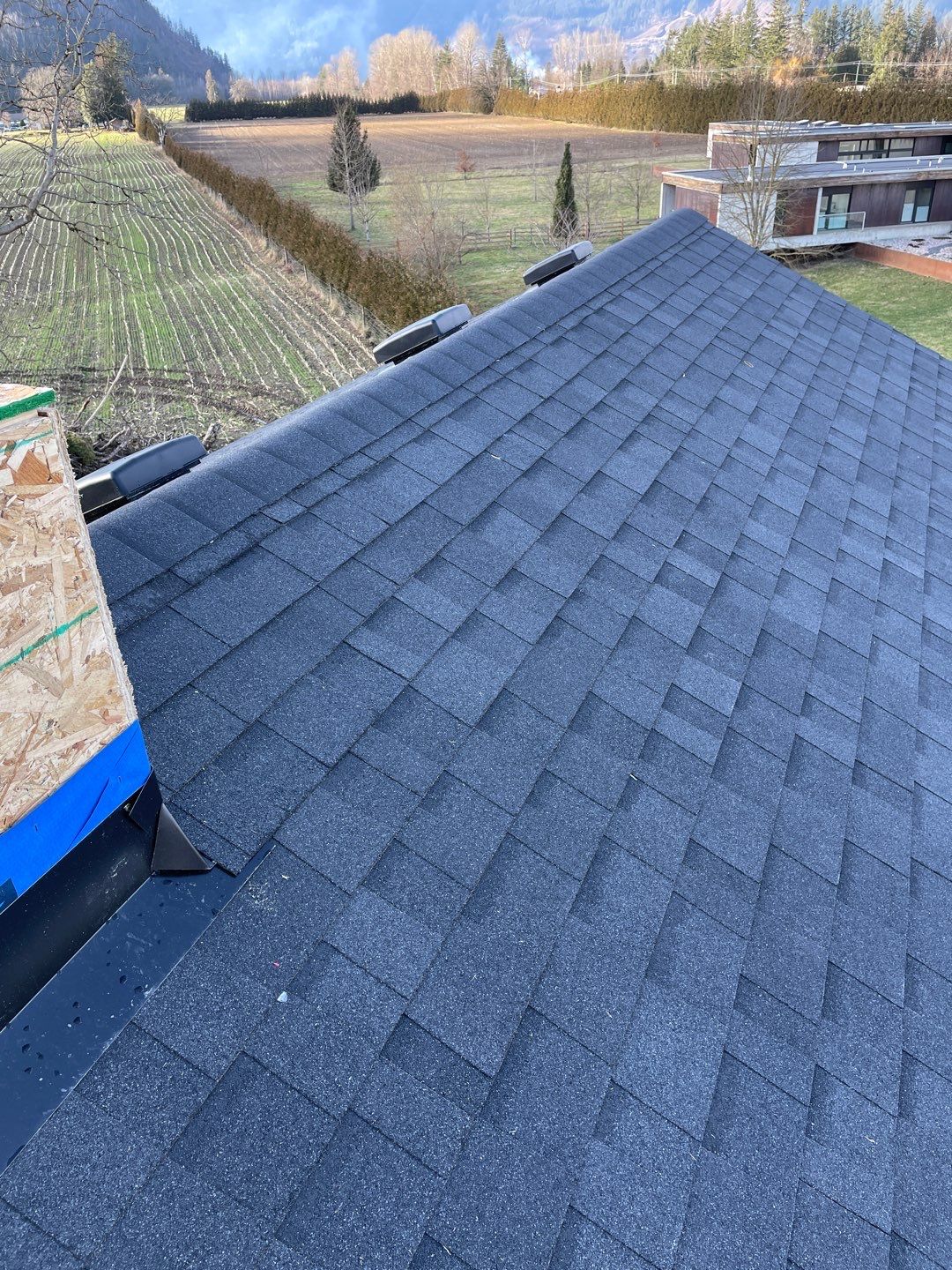 Residential Roofing Installation using 16" Prolok metal and Owens corning shingles by Top Notch Roofing Inc