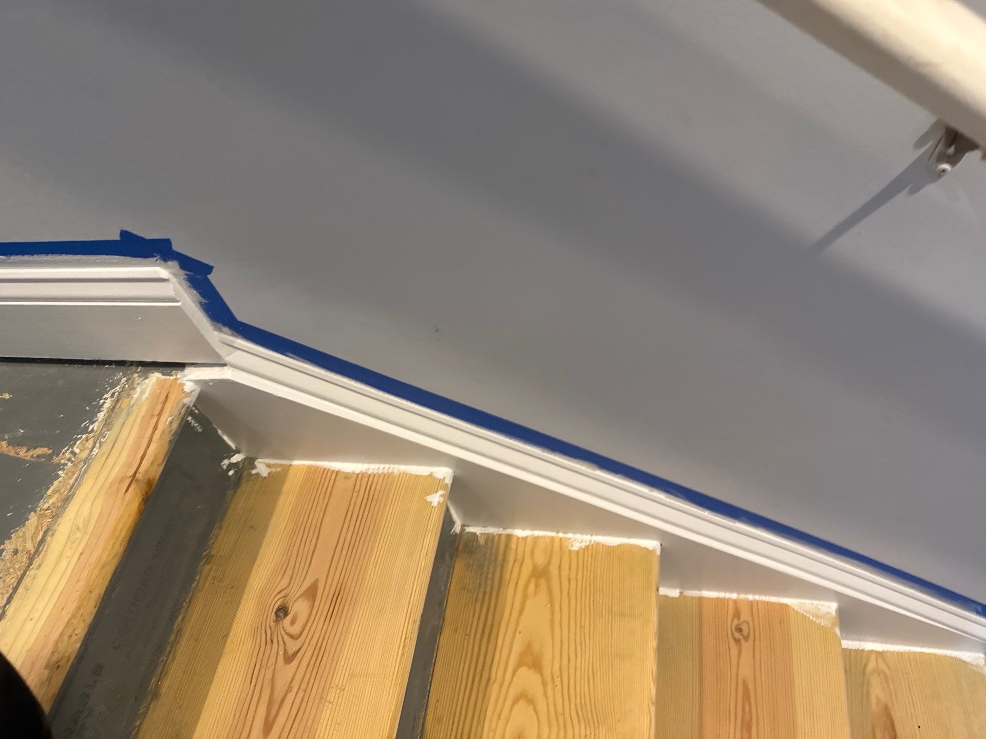 Stairway Installation using t vinyl stair tread and reversibleriser by La Bendicion Contruction Llc