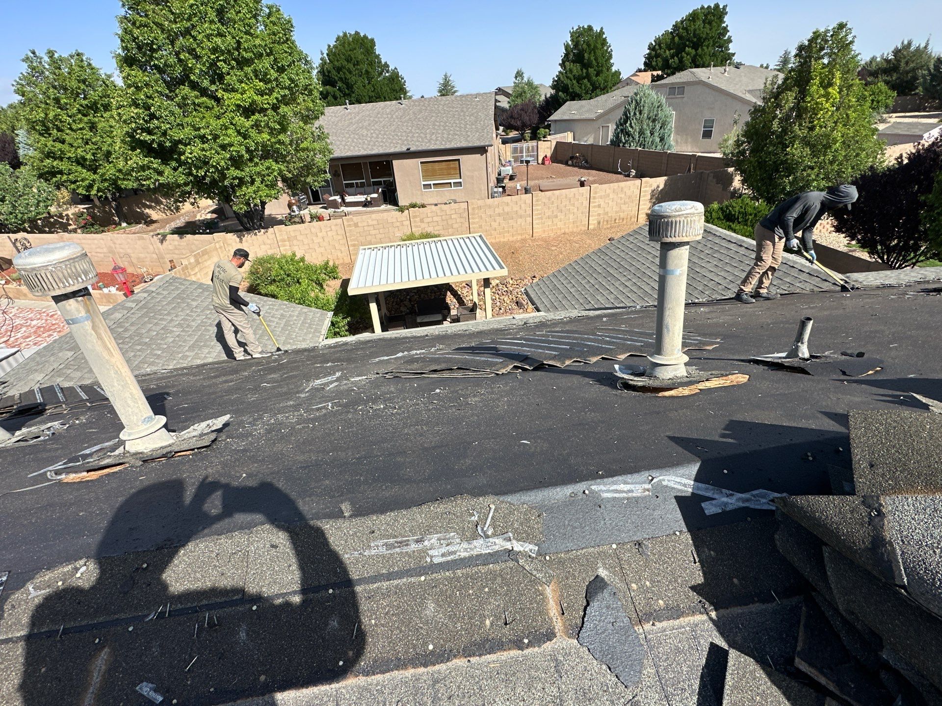 Residential Roofing Installation with Architectural Shingles and Turret Detail by Badger Roofing