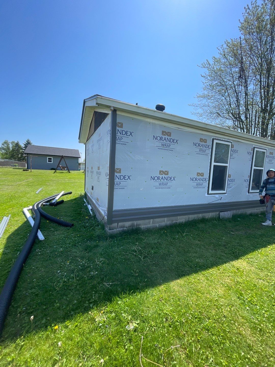 Roof and Siding Replacement using Norandex Cedar Knoll Graphite Siding and Owens Corning Durations in Onyx Black by WIW Enterprises Inc