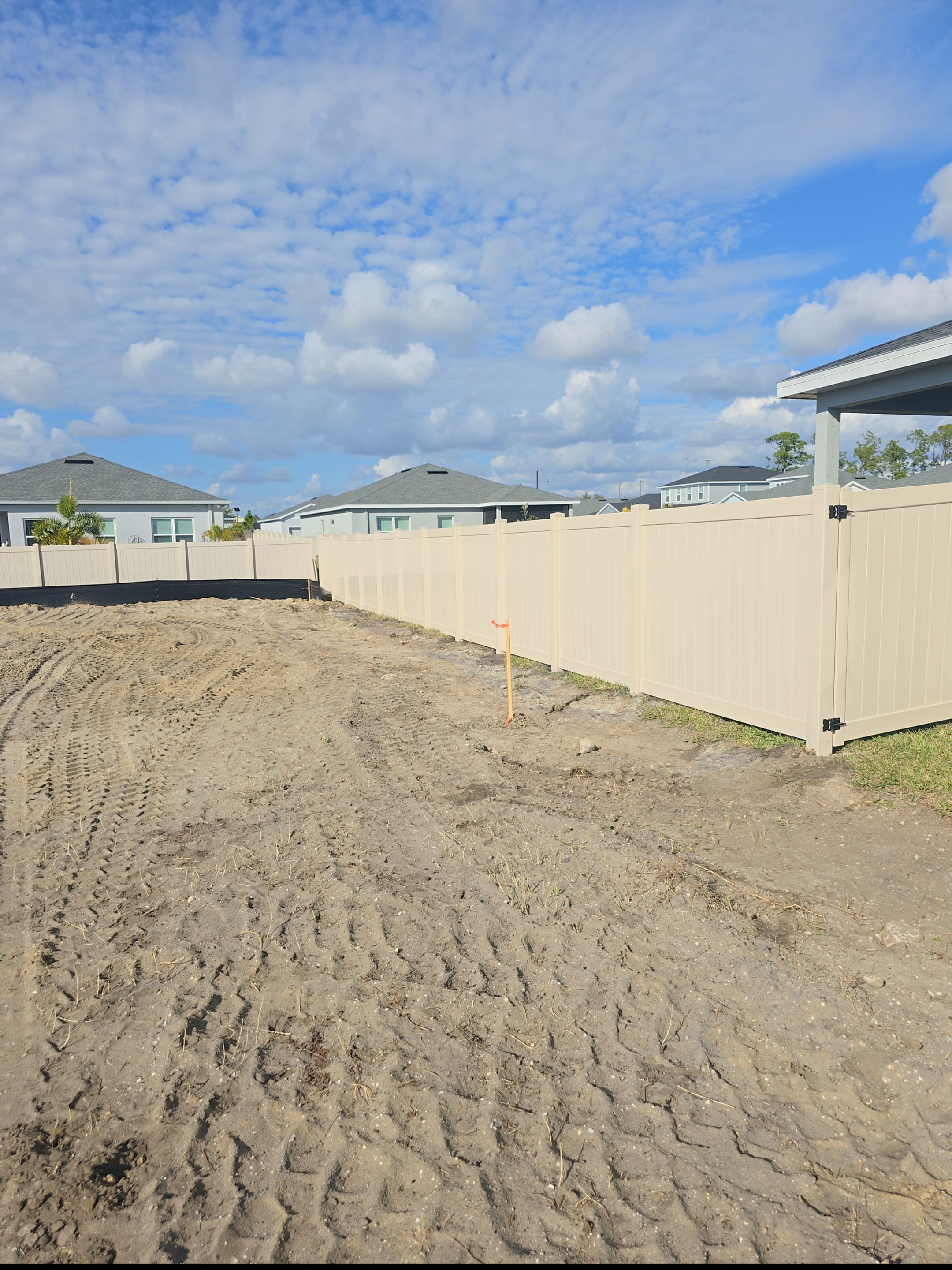 Tan Vinyl Fence in West Port by True Fence LLC