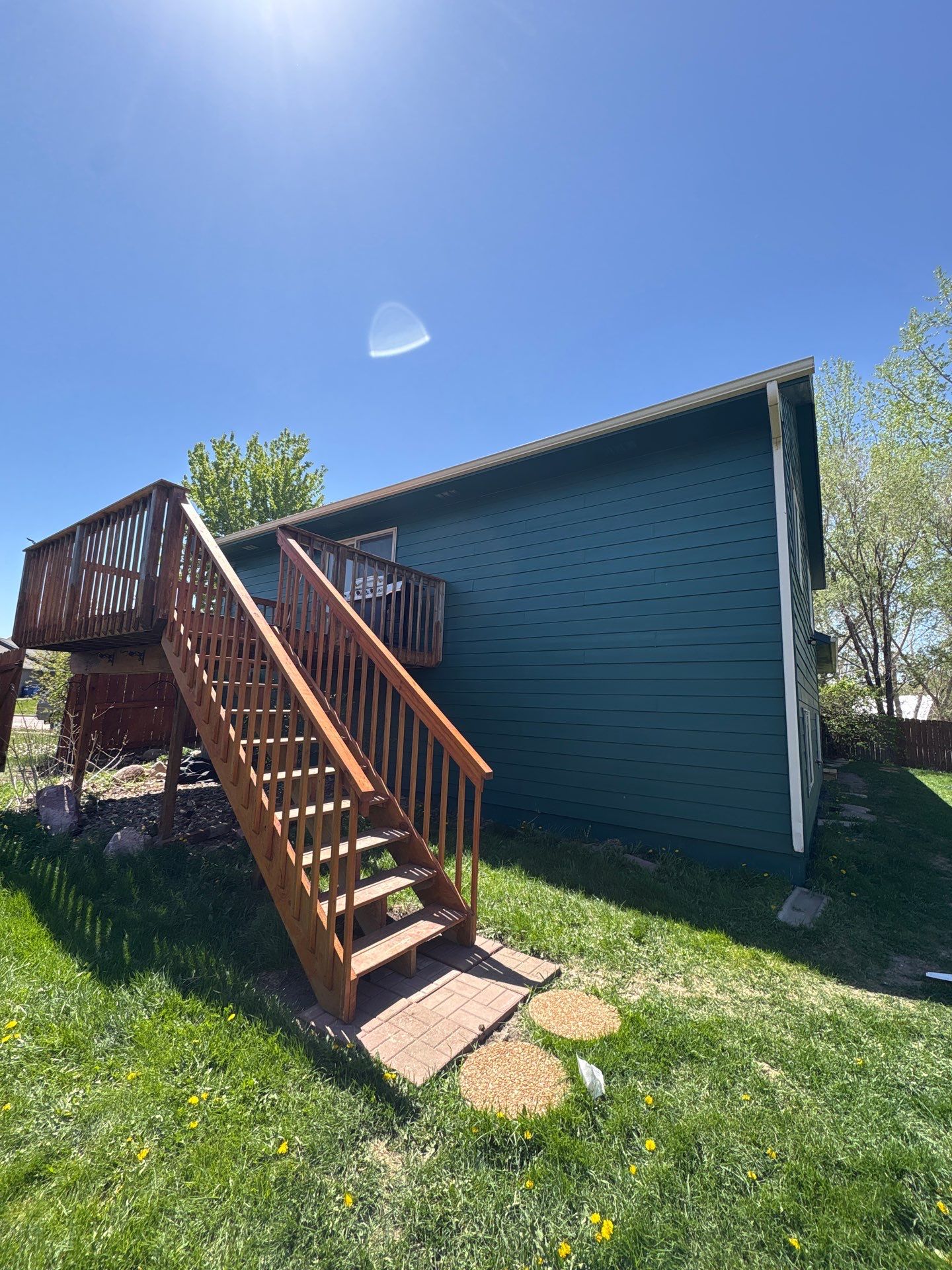 Full Exterior Residential Painting and Siding Refresh in Sioux Falls by Select Painting, Coatings & Garage Cabinets