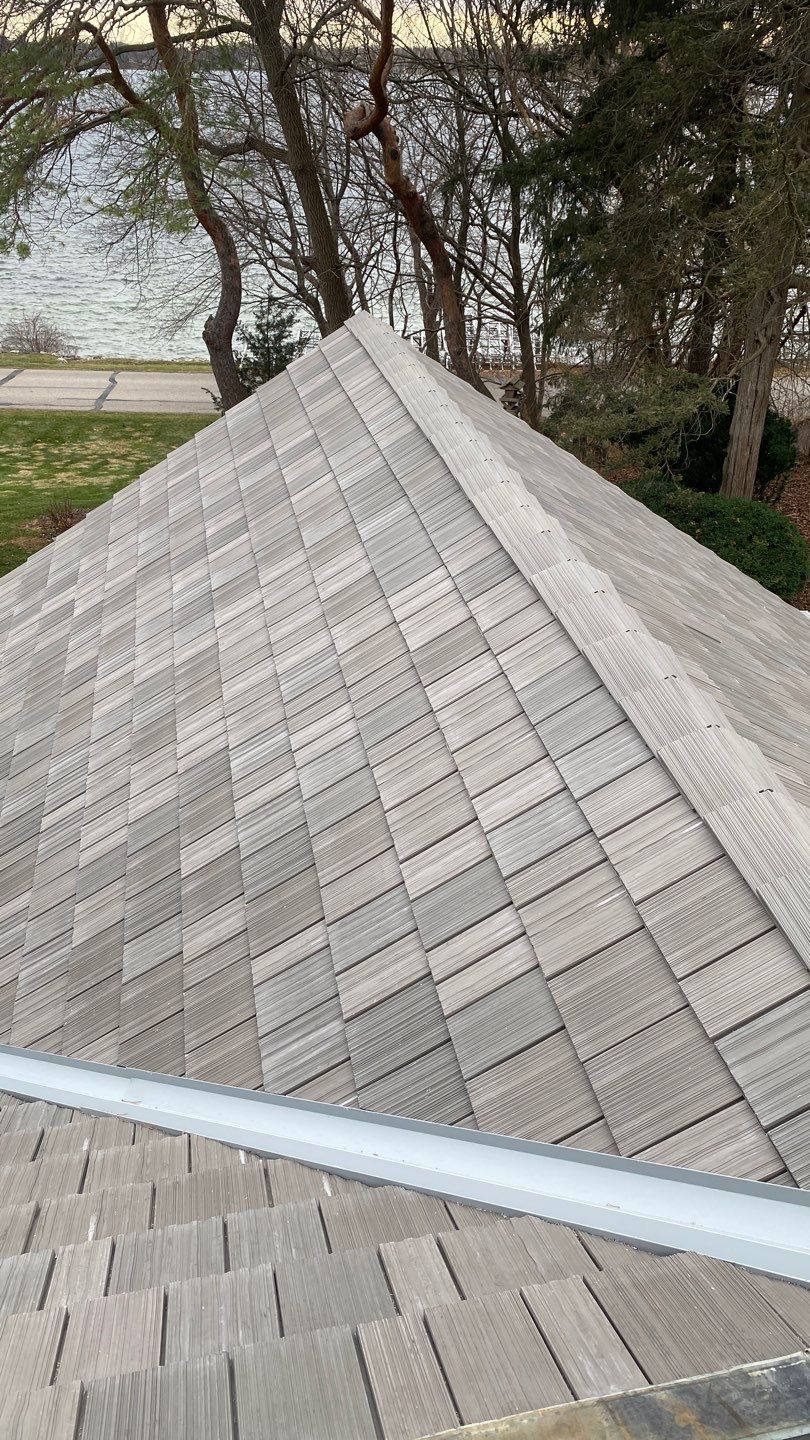 DaVinci Roof Installation with Snow Guards in Oconomowoc Lake by Custom Installations