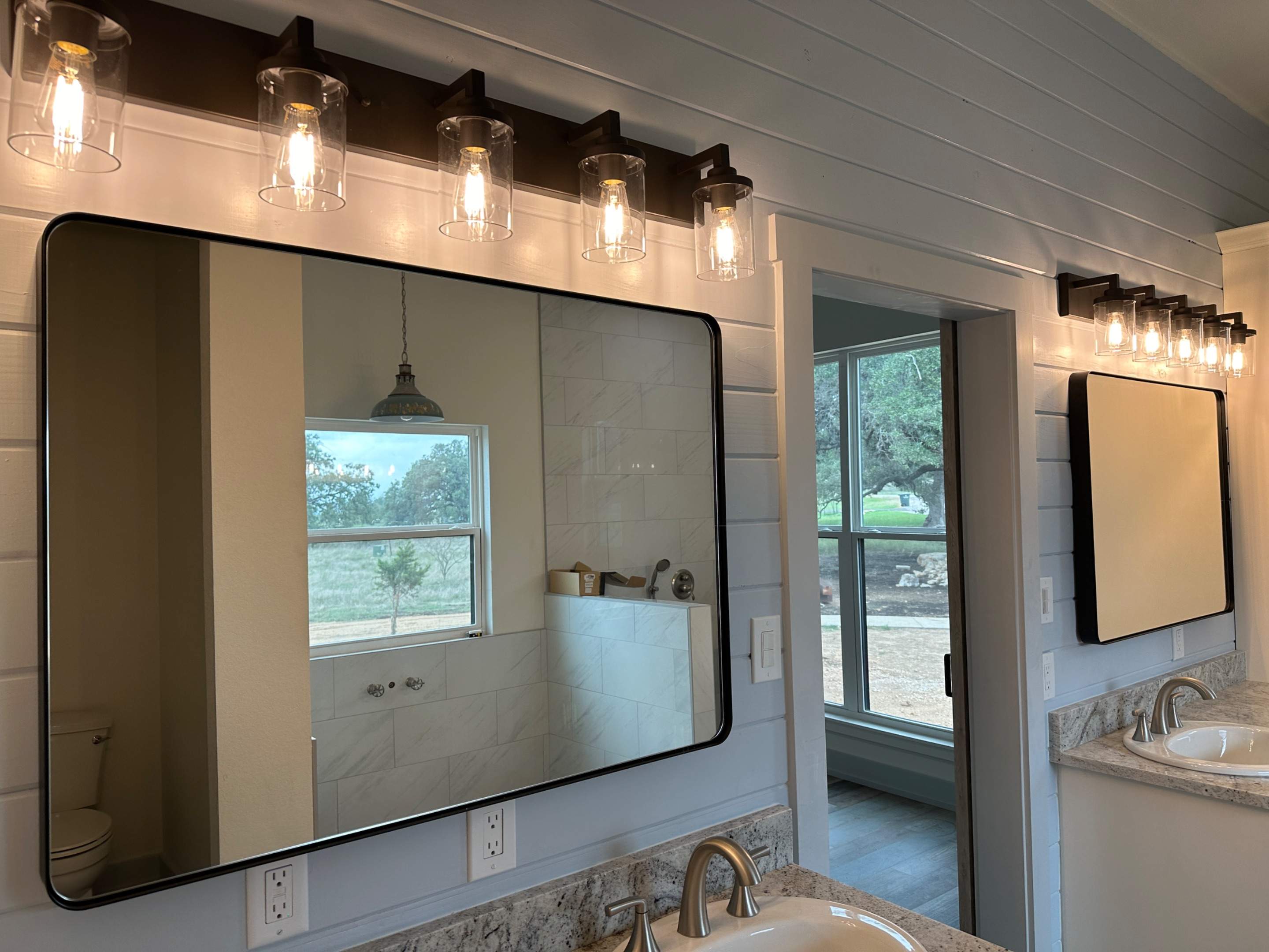 Antique shaker cabinets and granite kitchen and bathroom installation by Mena stone surfaces