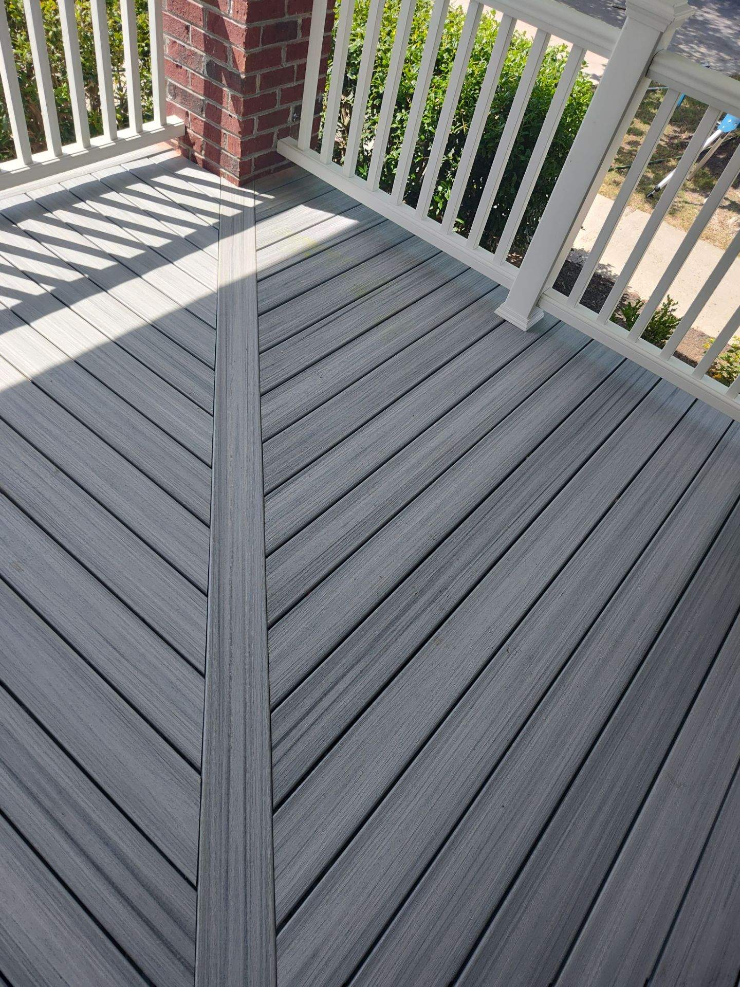 Outside porch and concreate work by Cornerstone Home Builders, LLC