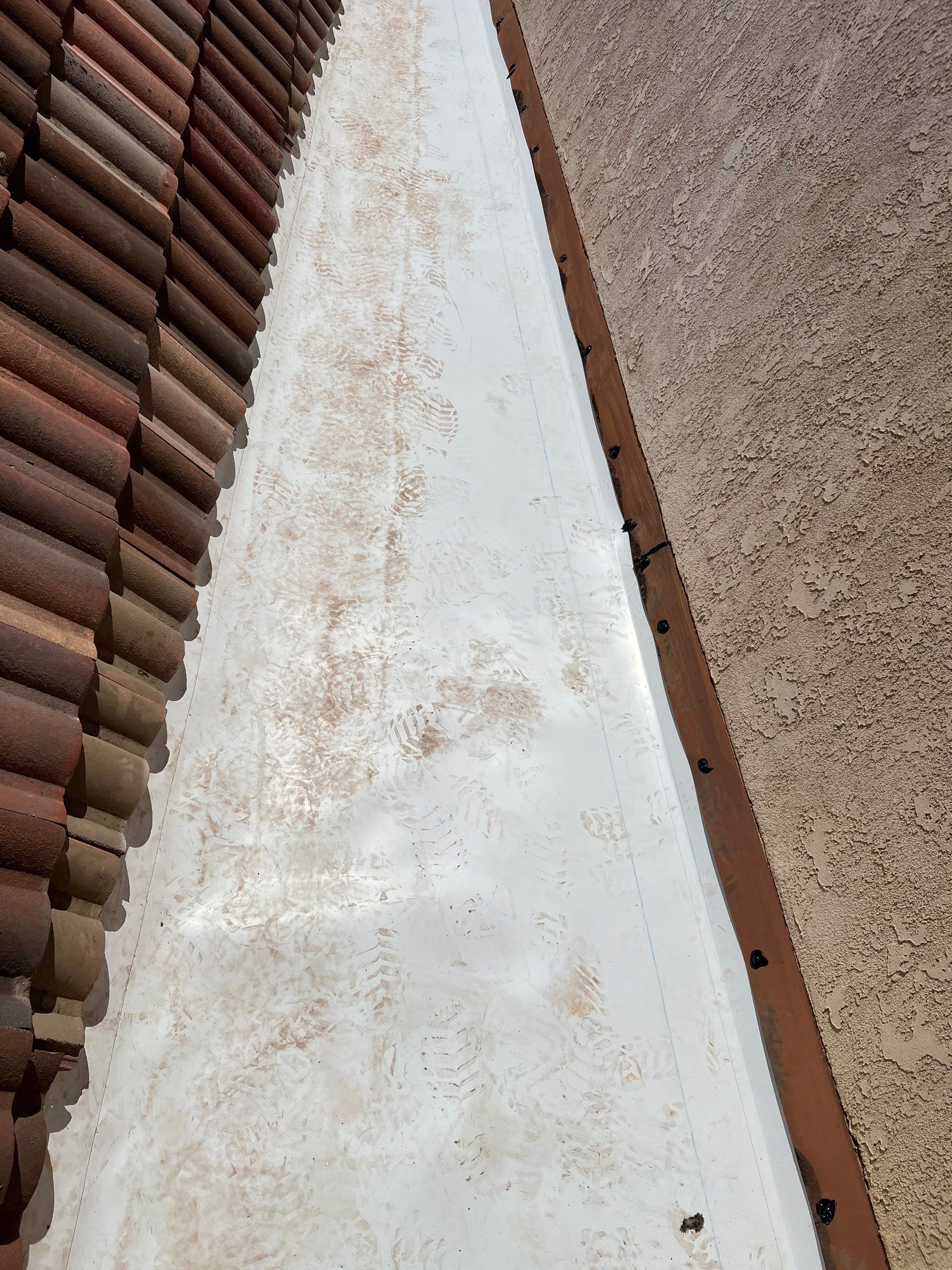 Tile Roof repair by Grandmark Service Company