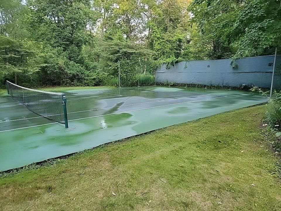 Deck, Patio, and Tennis Court Cleaning by Northern Power Washing LLC.