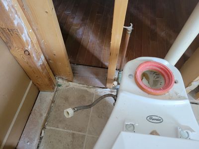 Toilet supply line break in 2nd level Master Bathroom