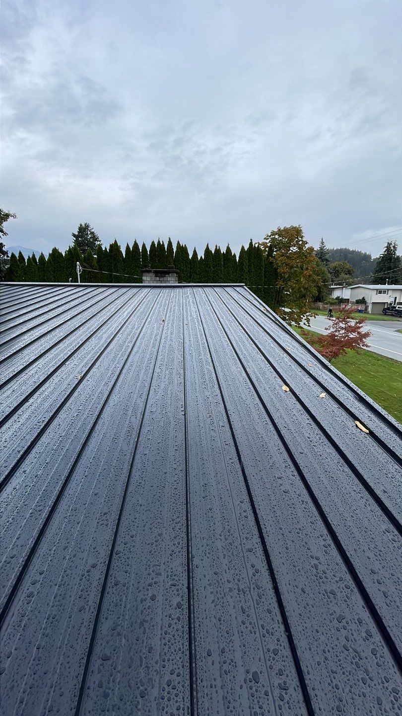 Residential Roofing Installation using 12" Prolok metal  by Top Notch Roofing Inc