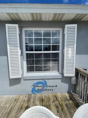 Impact Colonial Shutters in Signal White