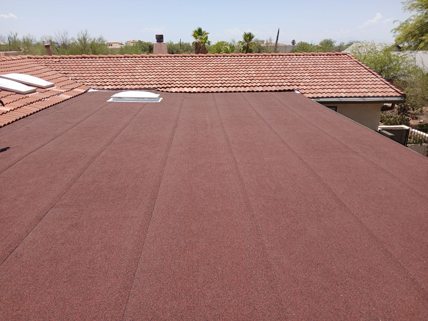 Residential Tile Roof Restoration and Low Slope Membrane Replacement in Tucson by West Coast Roofing AZ