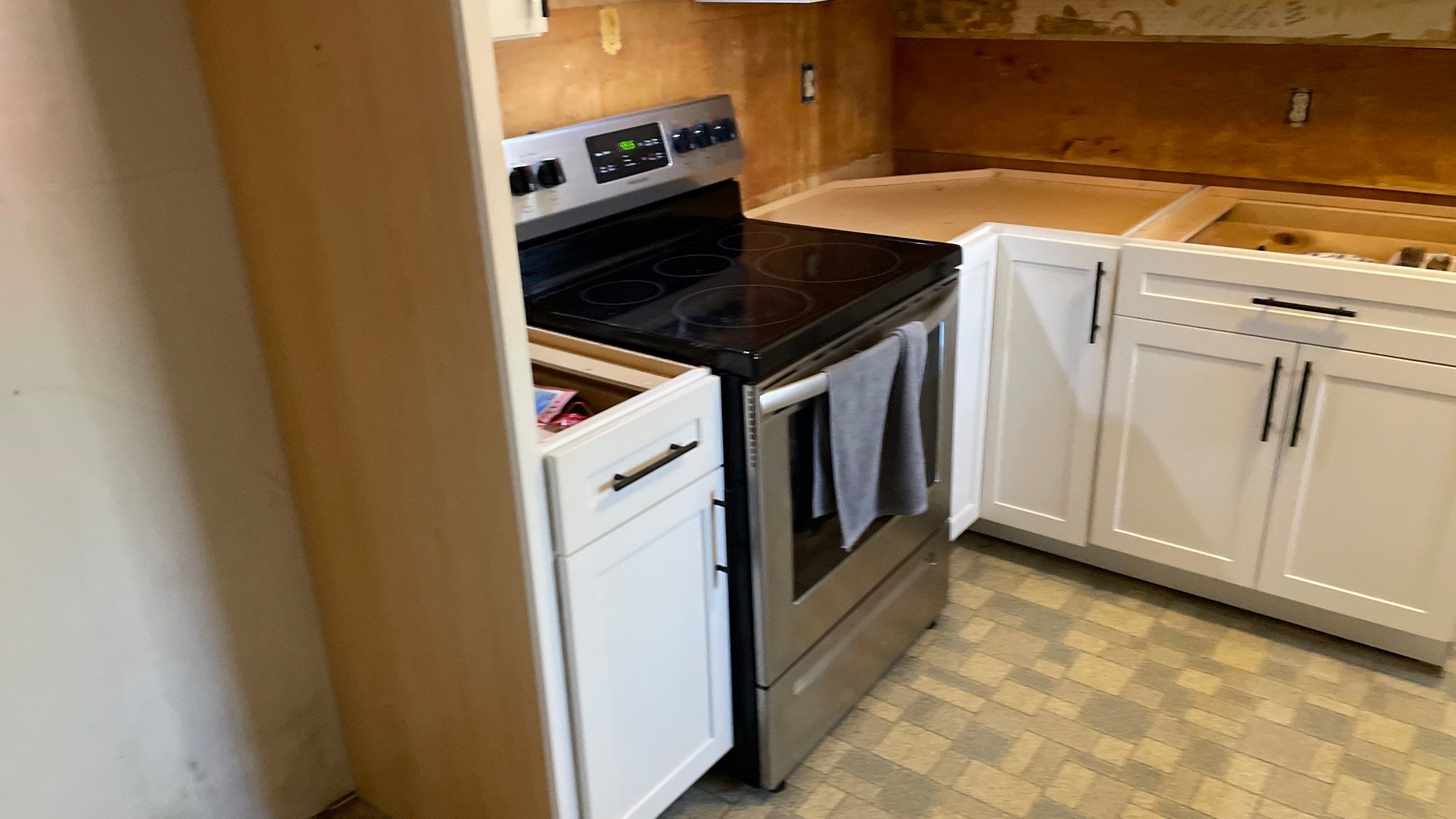 Kitchen Backsplash and Herringbone Tile Floor Remodel by Footprints Floors of Coastal Carolina