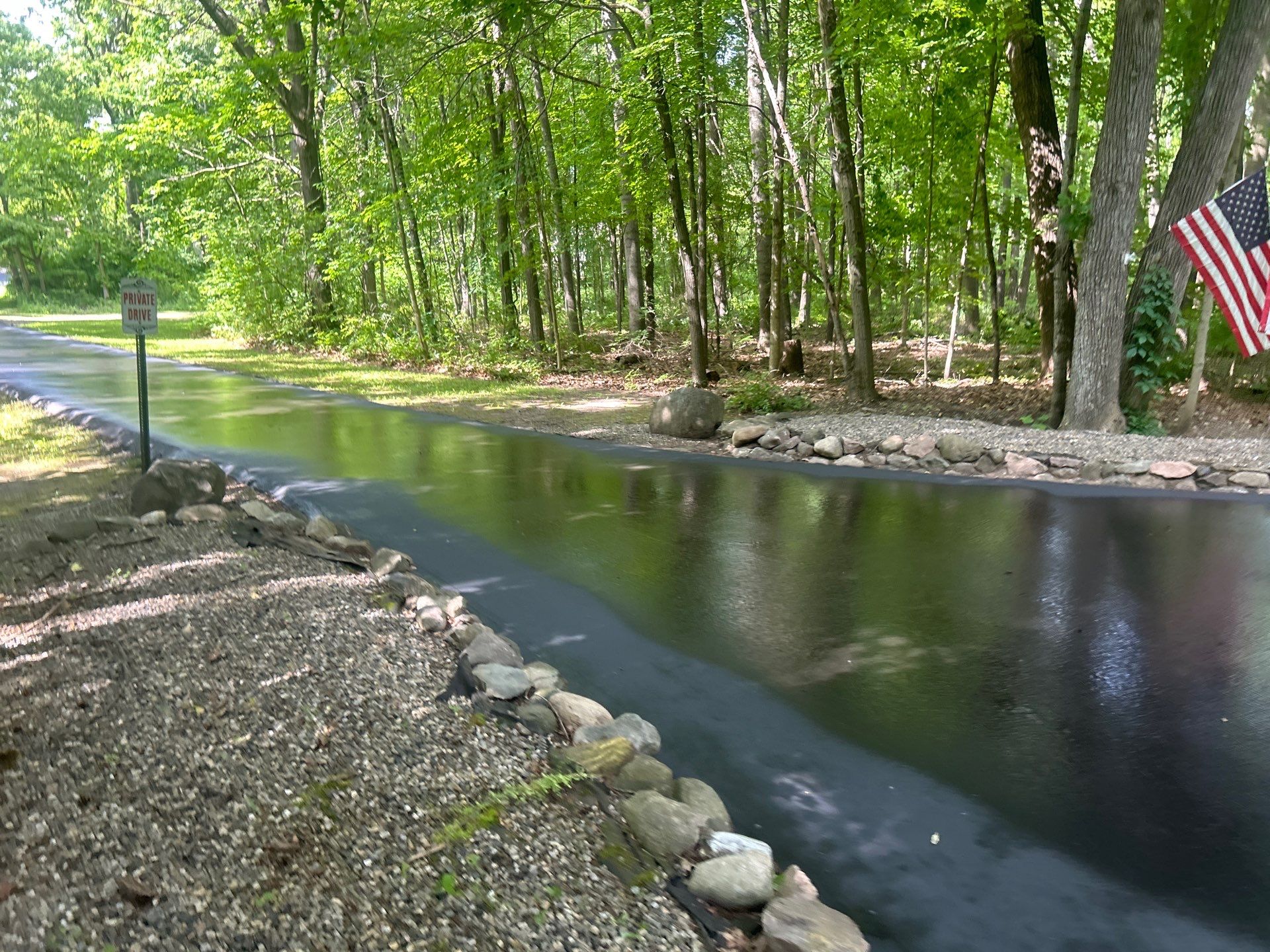 High end residential driveway by Quality Asphalt & Maintenance LLC