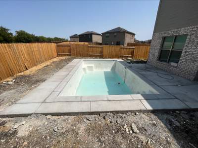 Geometric Pool with Stone Deck and Coping