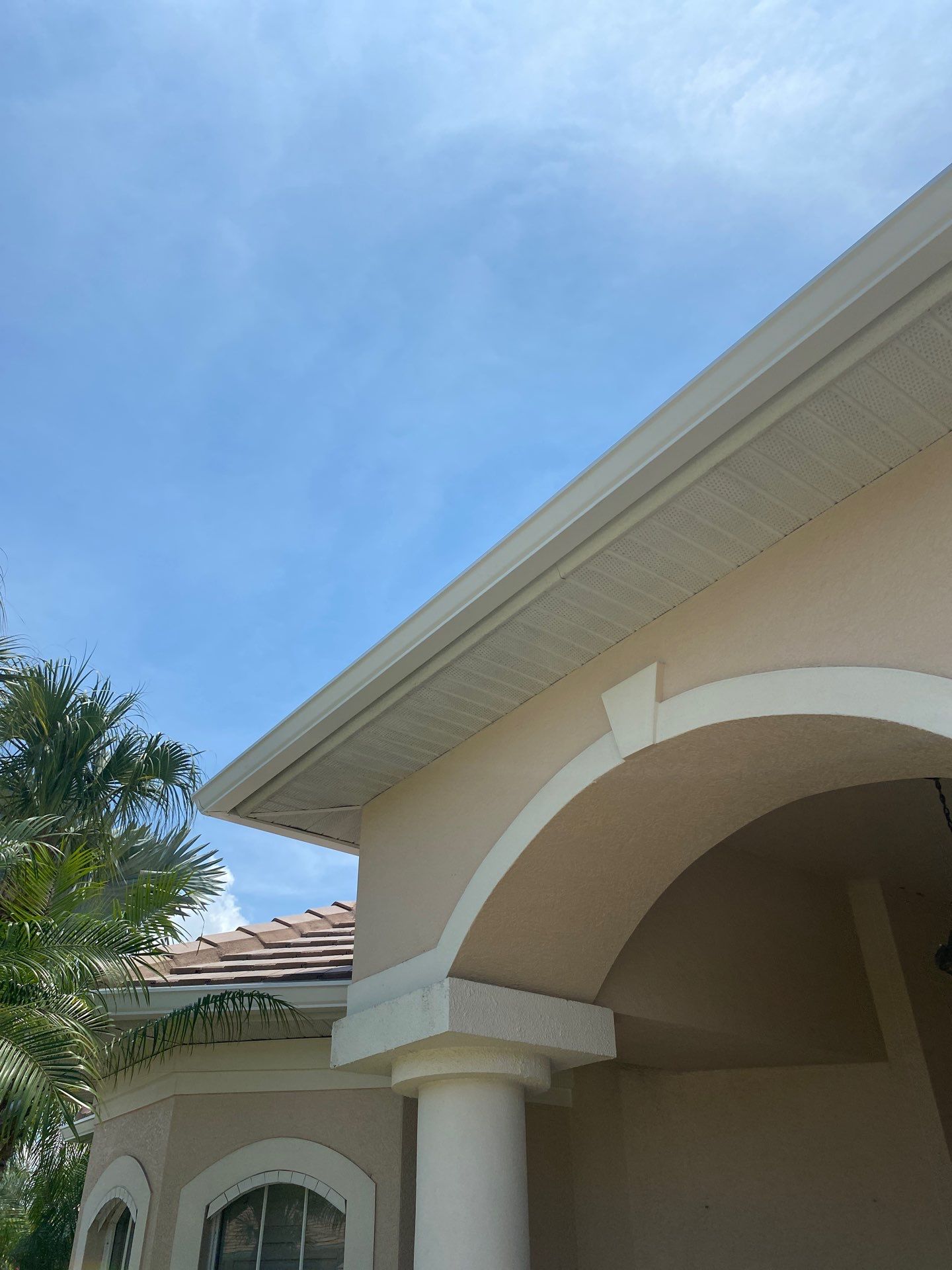 Seamless Gutter Upgrade Before & After in Bonita Springs FL by Gutter Professors