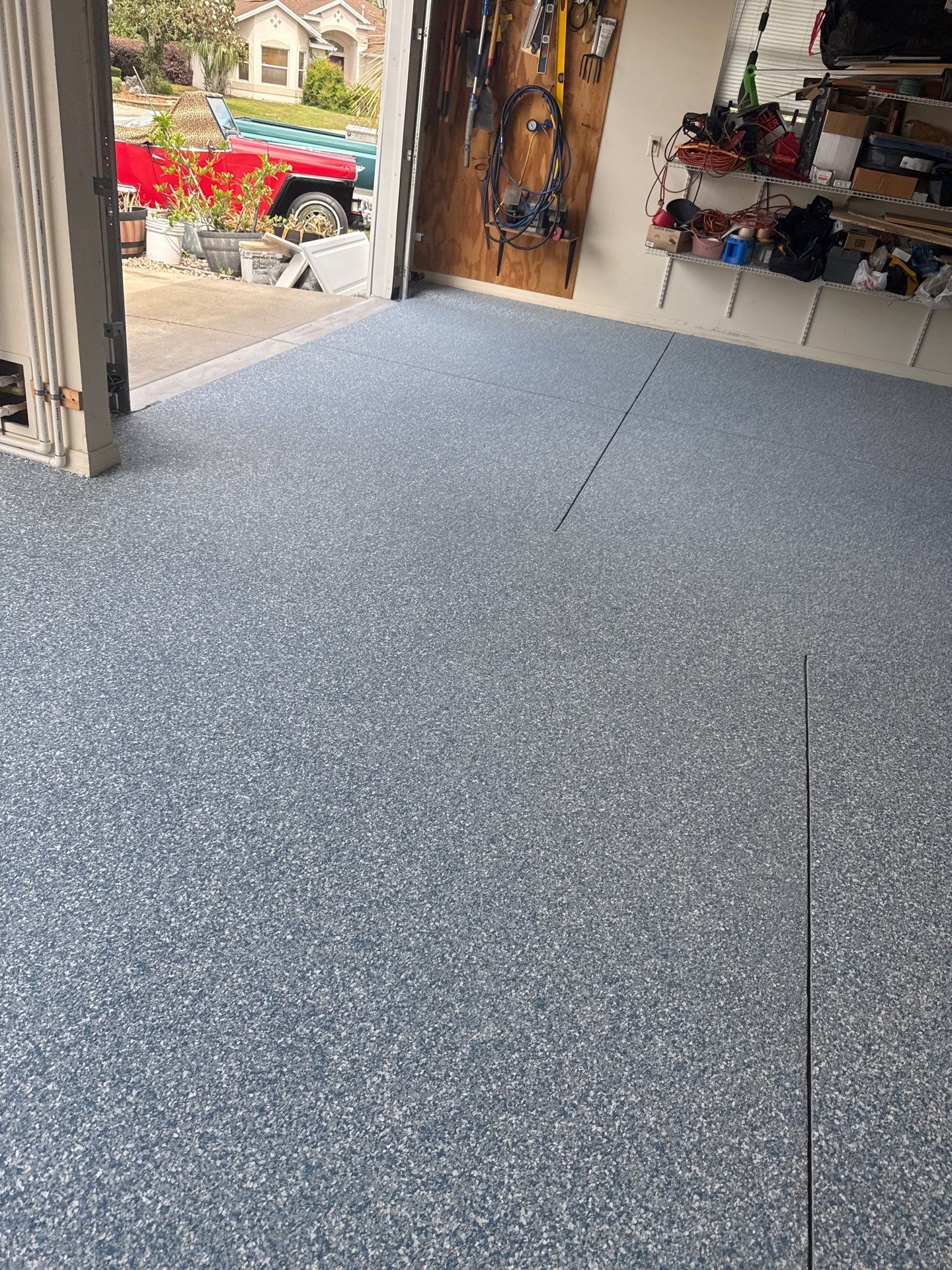 Garage, Drivewat, and Sidewalk in Landshark and Tidalwave by Innovative Concrete Coatings 