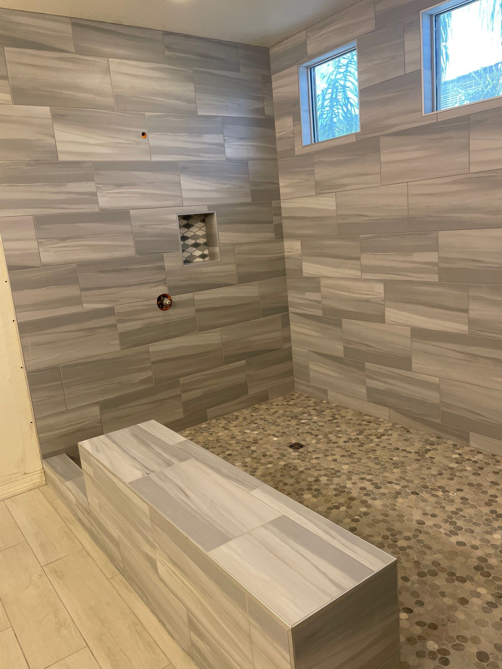 Wood Look Tile Floors and an Extra Large Shower  by Footprints Floors of Chandler 