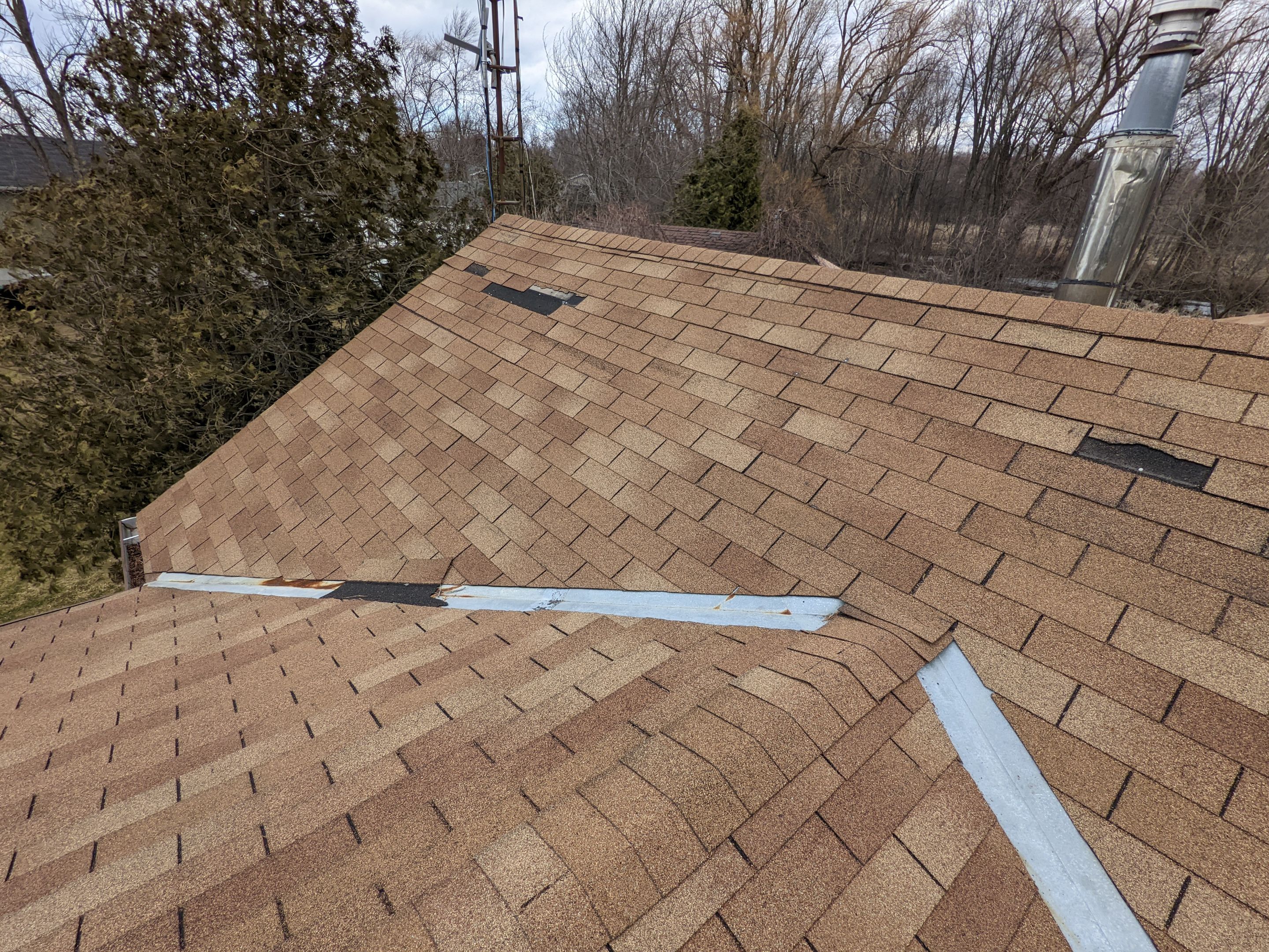 Residential Roofing Installation using 16" Standing Seam Panels by Jay Carter Roofing & Sheet Metal