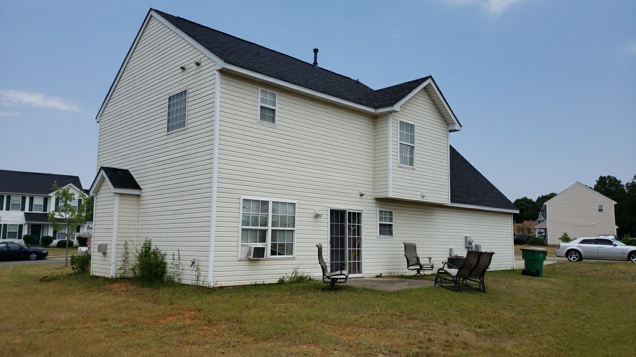House Wash using cleaner by Power Wash Masters LLC